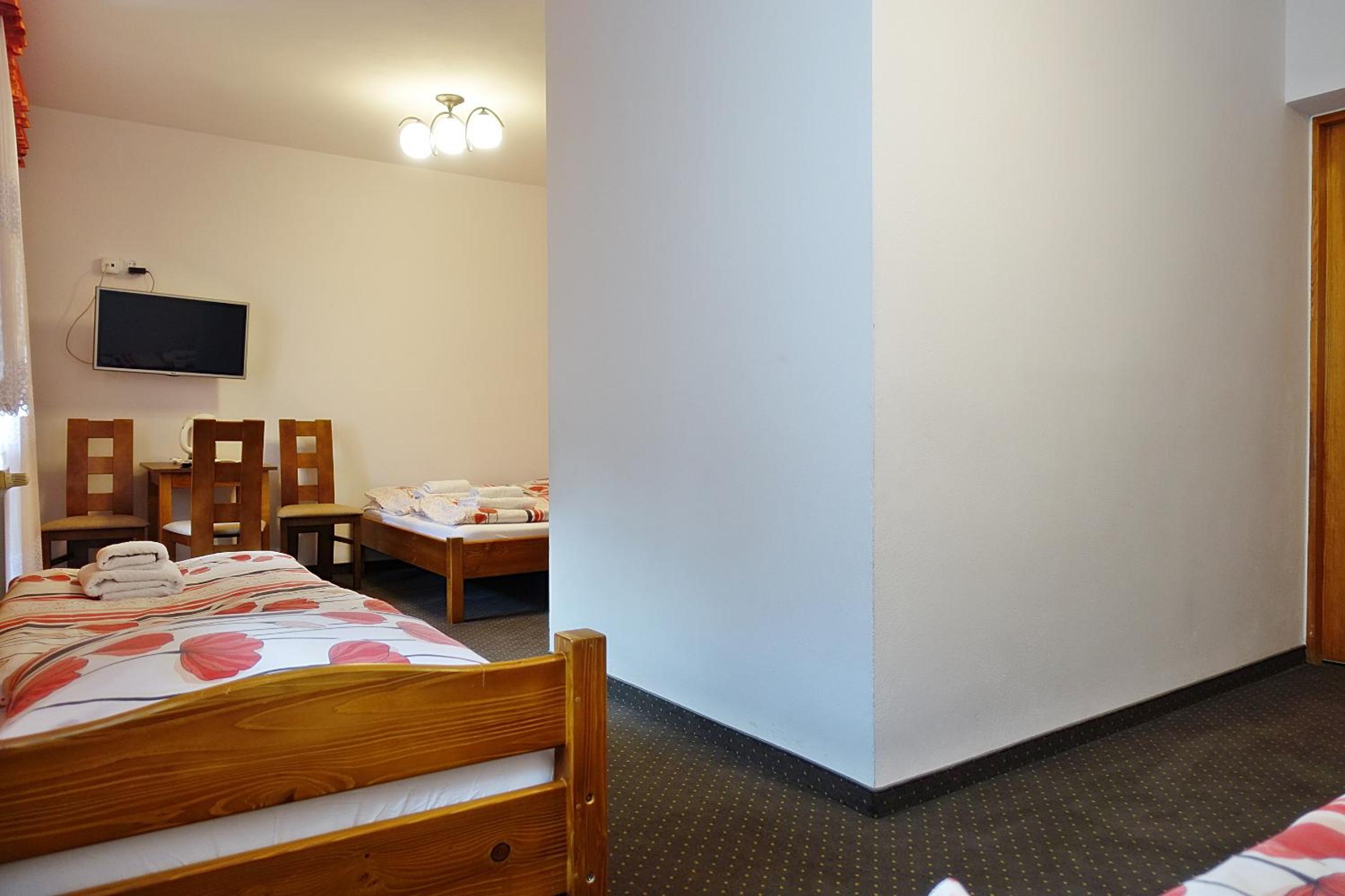 Quadruple Room with Balcony - Photo 1