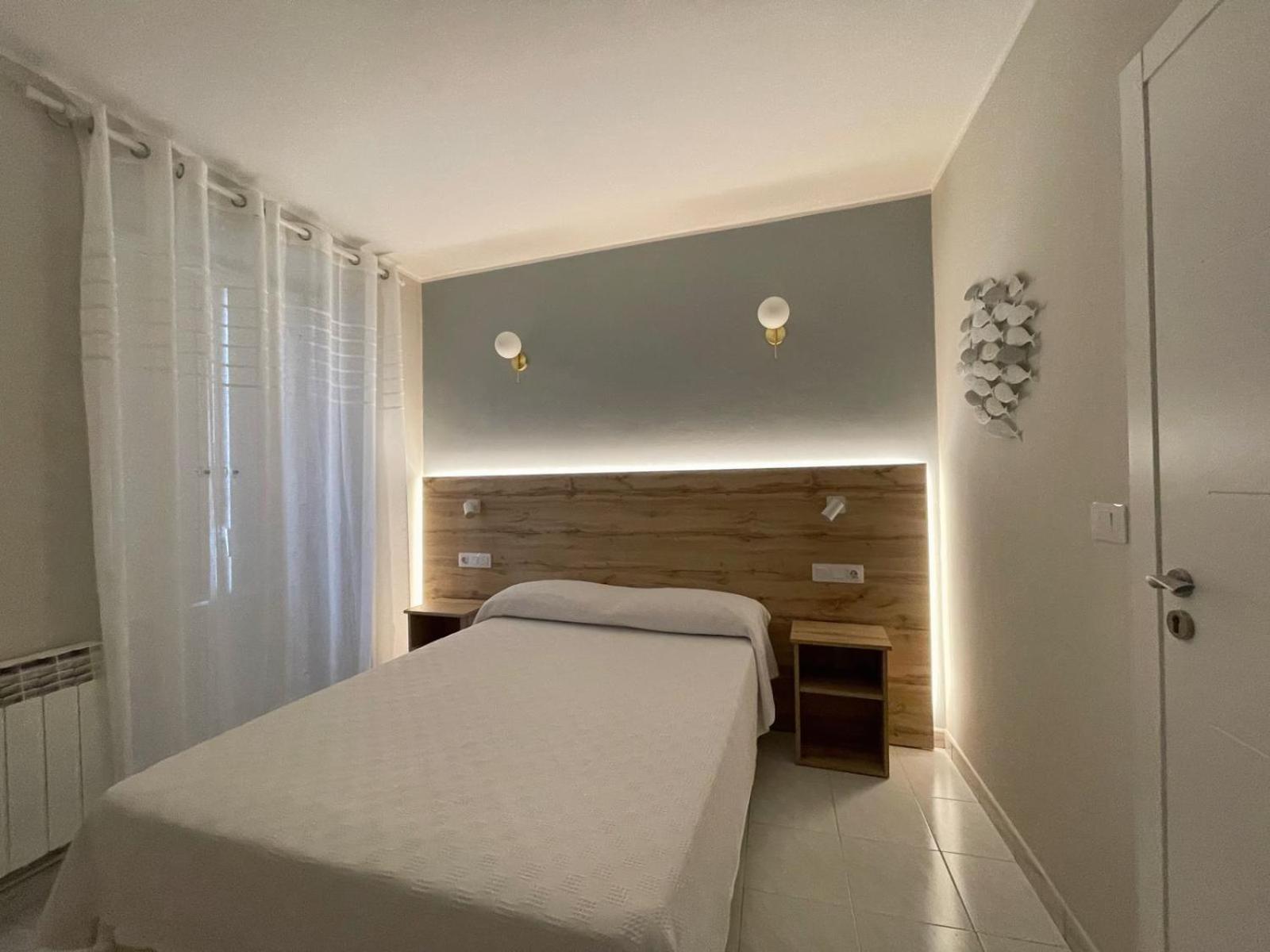 Habitación Estándar con Cama Queen
