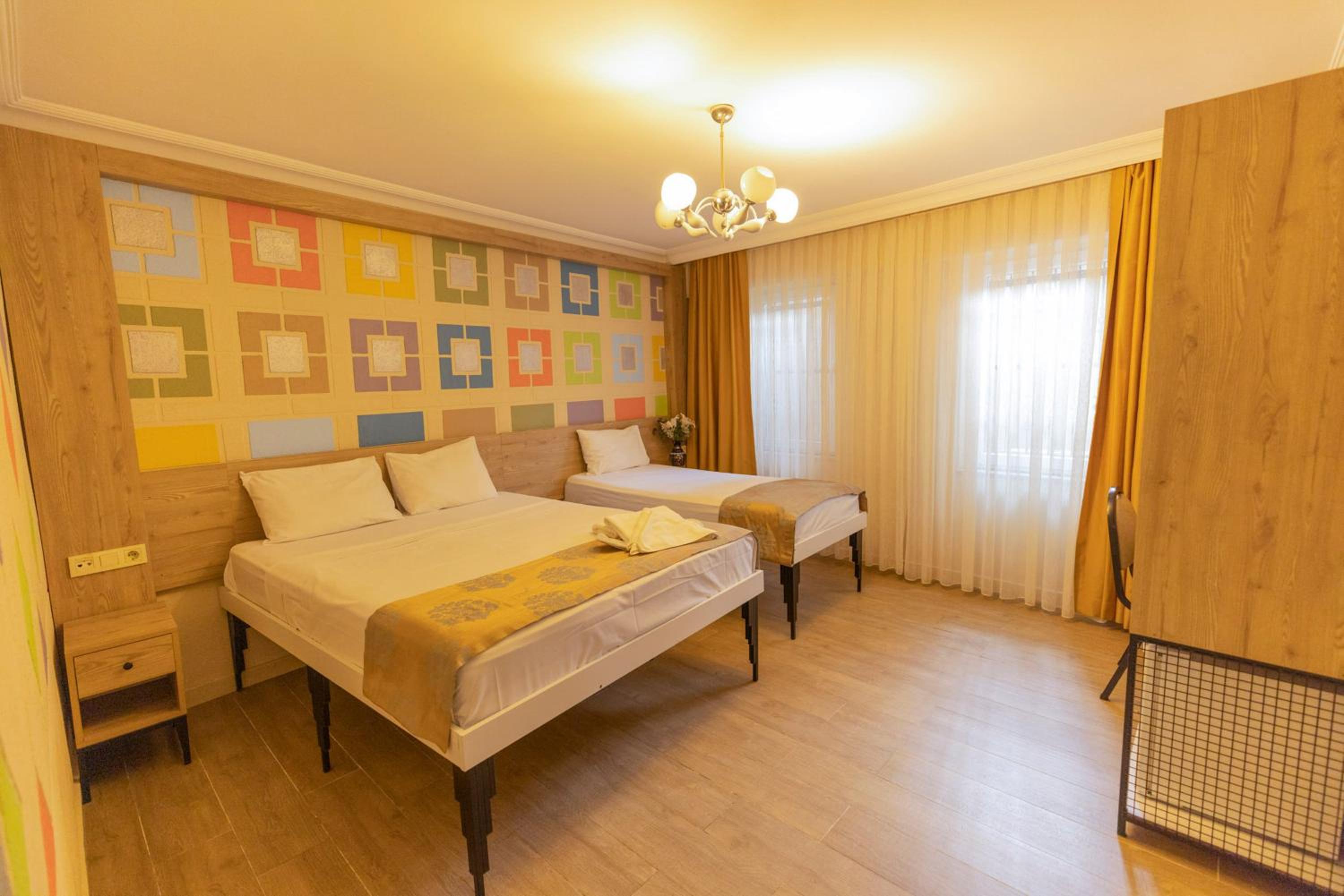 Economy Triple Room photo 2