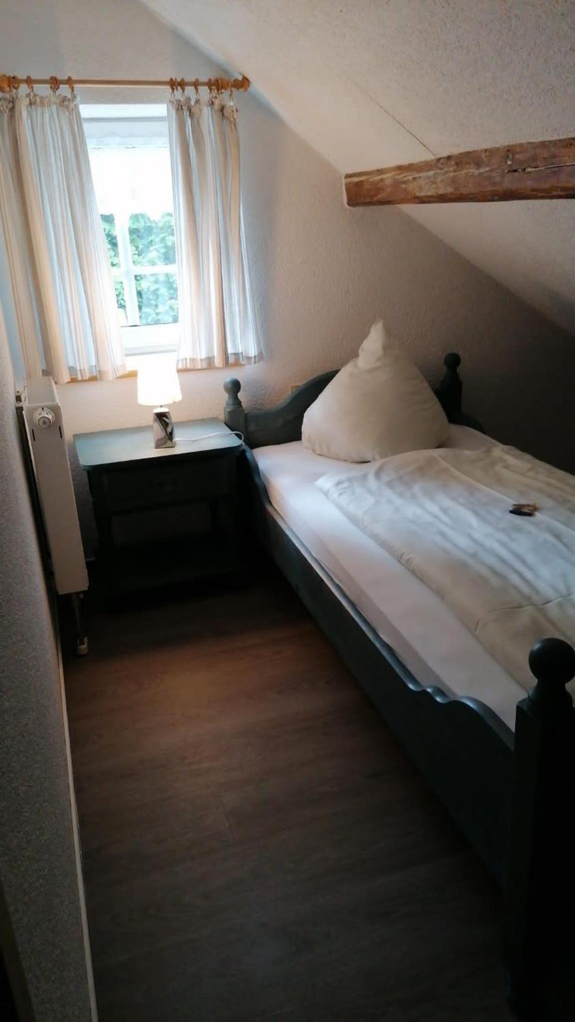 Basic Triple Room with Shared Bathroom photo 3