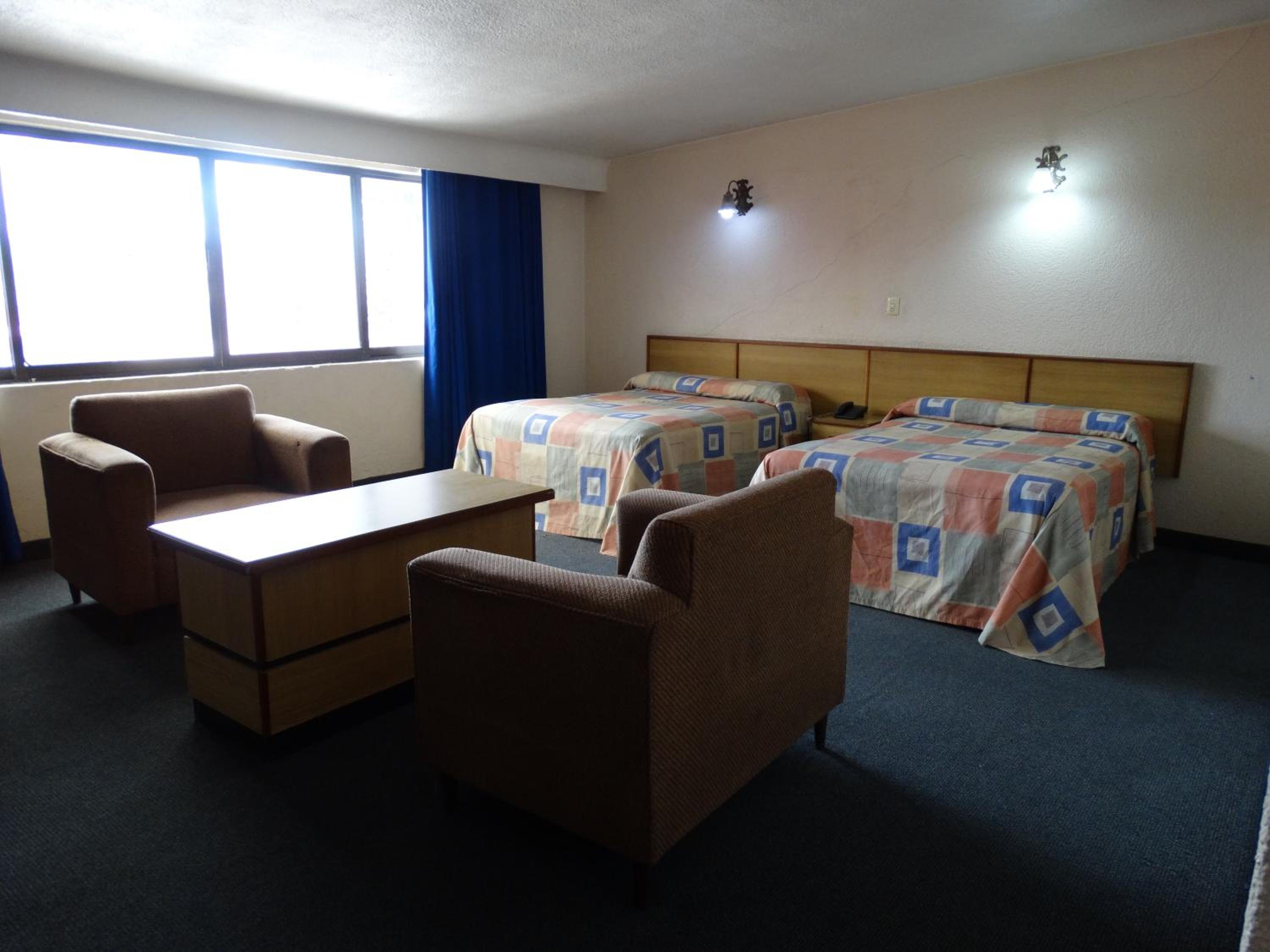 Deluxe Queen Room with Two Queen Beds photo 1