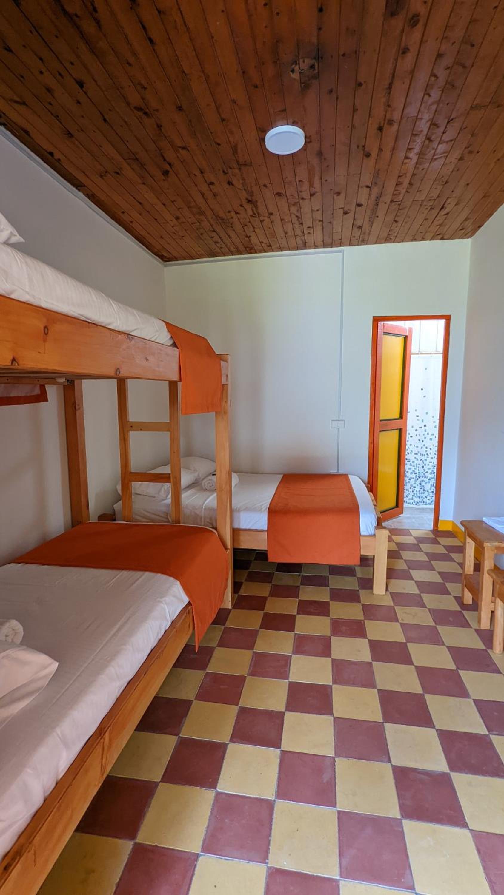 Quadruple Room with Private Bathroom photo 1