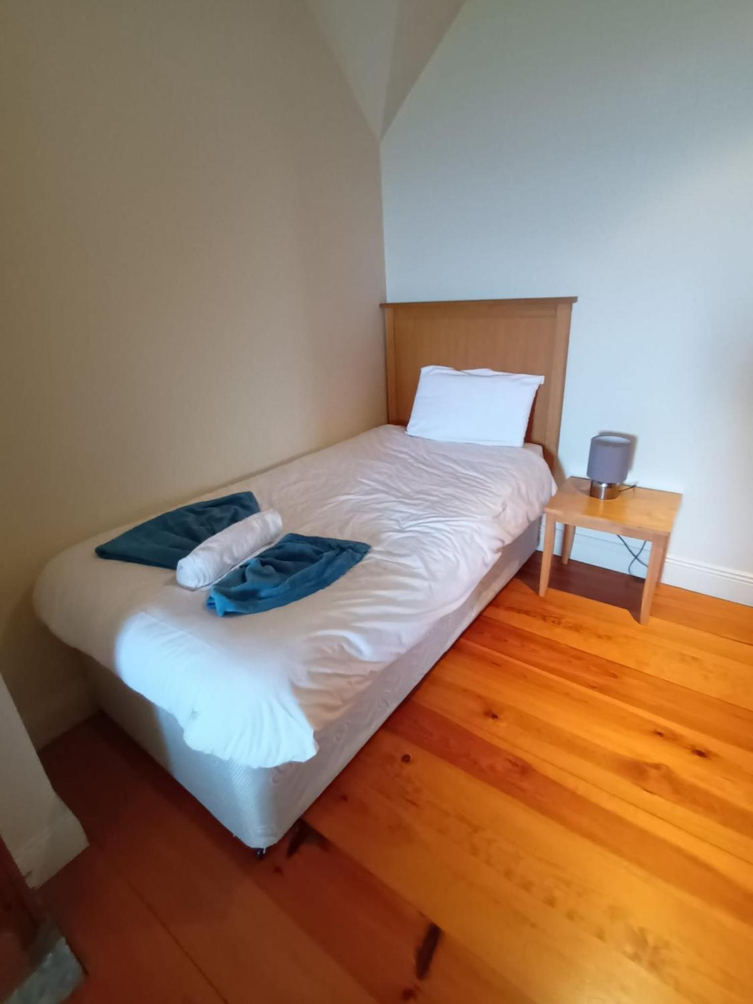 Three-Bedroom House - Photo 31