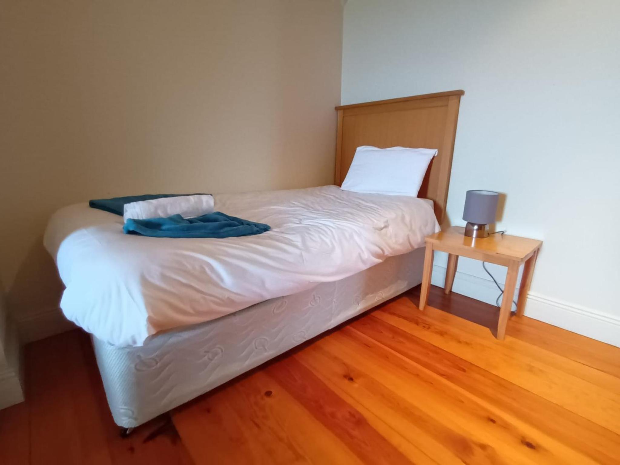 Three-Bedroom House - Photo 30