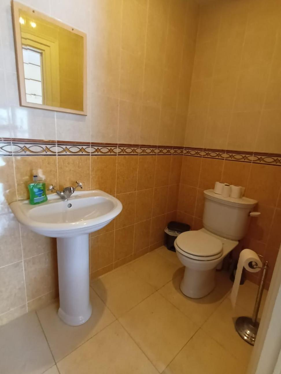 Three-Bedroom House - Photo 39