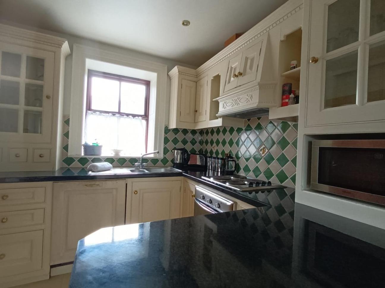 Three-Bedroom House - Photo 35