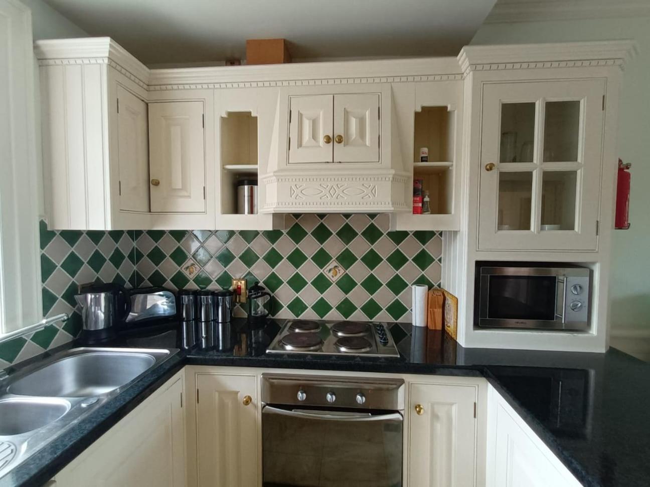 Three-Bedroom House - Photo 25