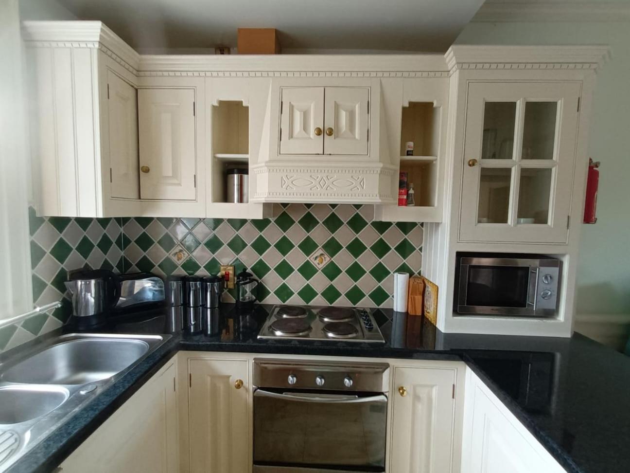 Three-Bedroom House - Photo 27