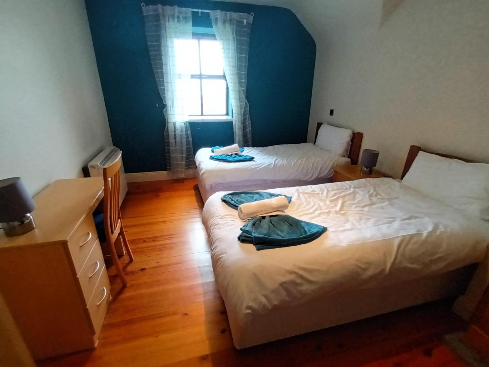 Three-Bedroom House - Photo 3