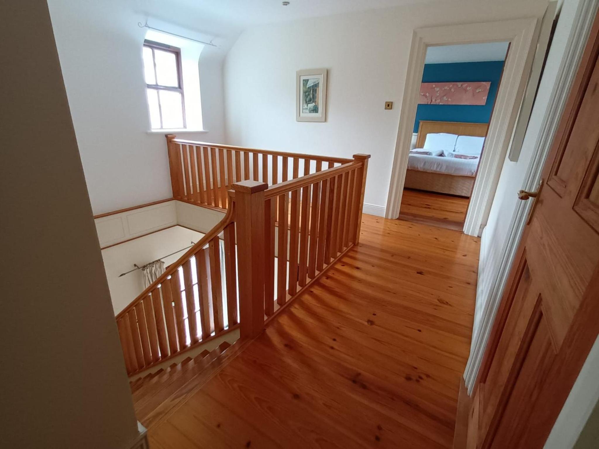 Three-Bedroom House - Photo 18