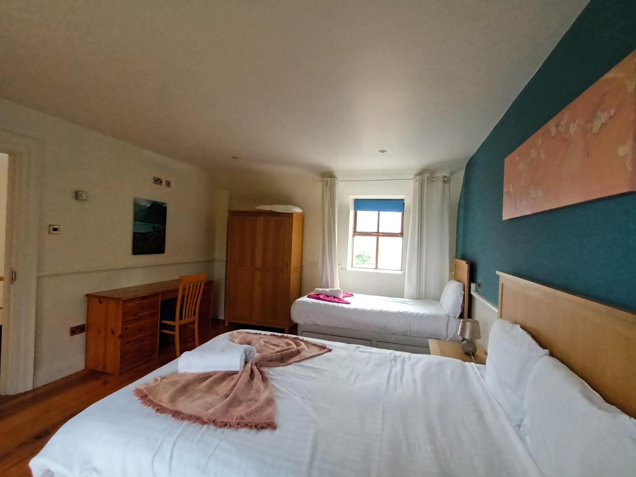 Three-Bedroom House - Photo 17