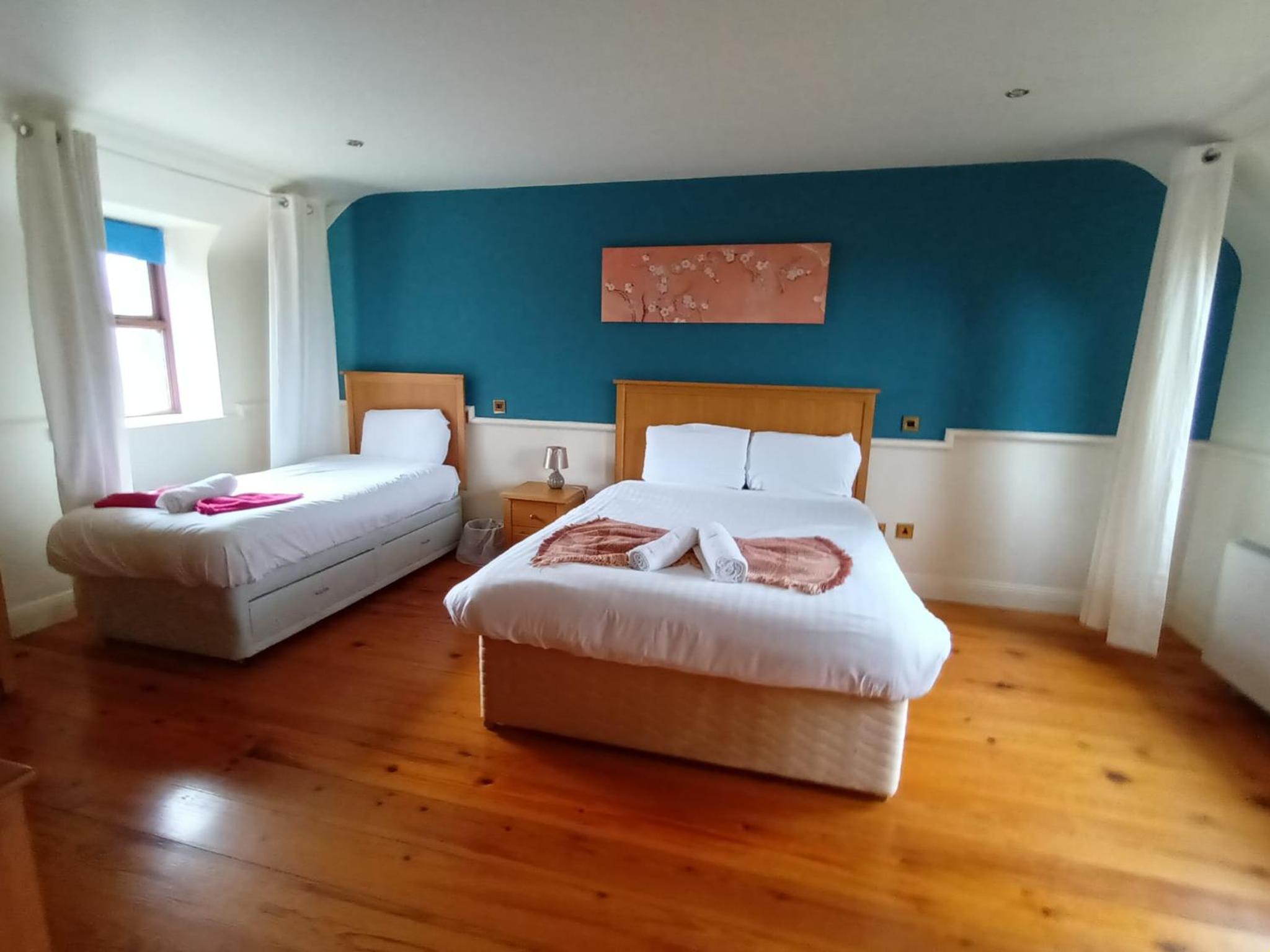 Three-Bedroom House - Photo 16