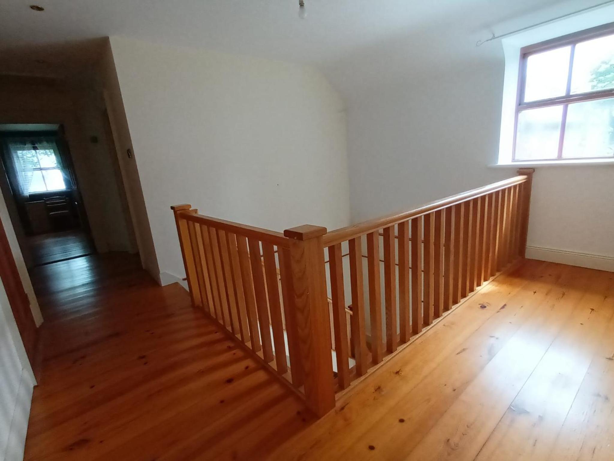 Three-Bedroom House - Photo 46