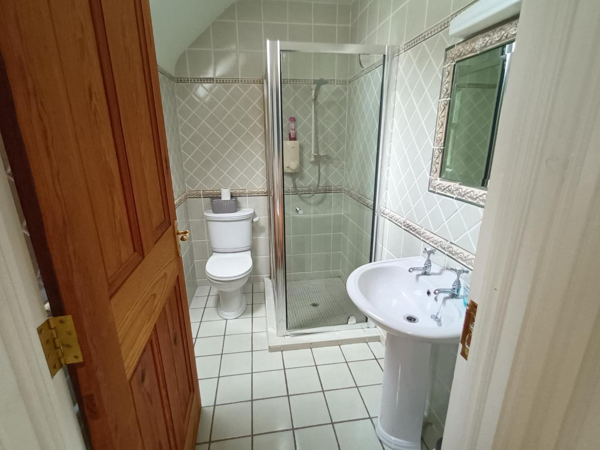 Three-Bedroom House - Photo 38