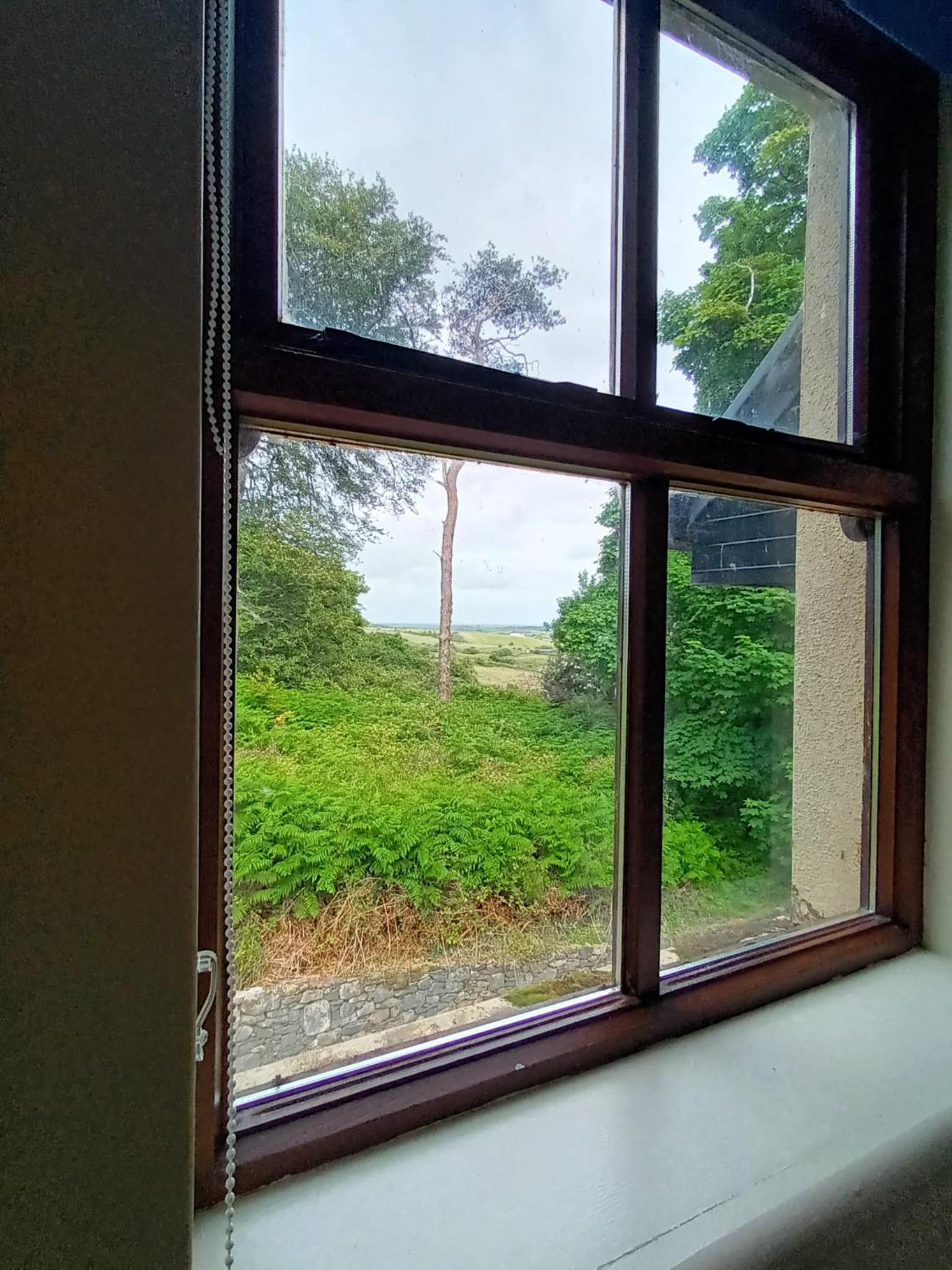 Three-Bedroom House - Photo 23
