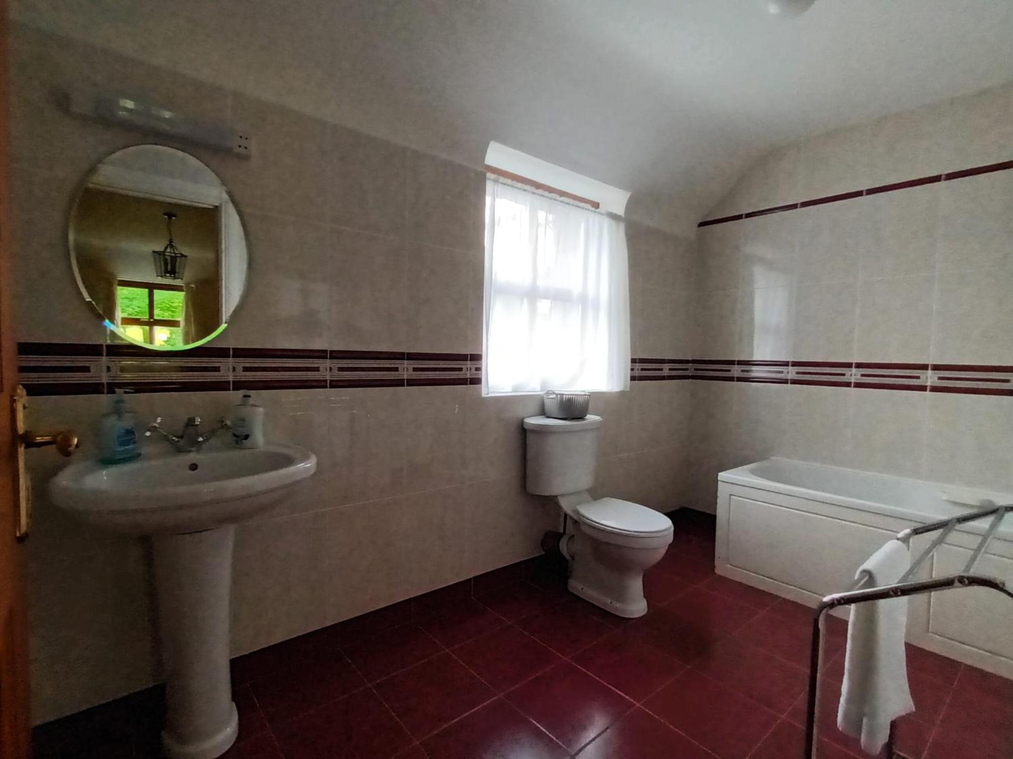 Four-Bedroom House - Photo 5