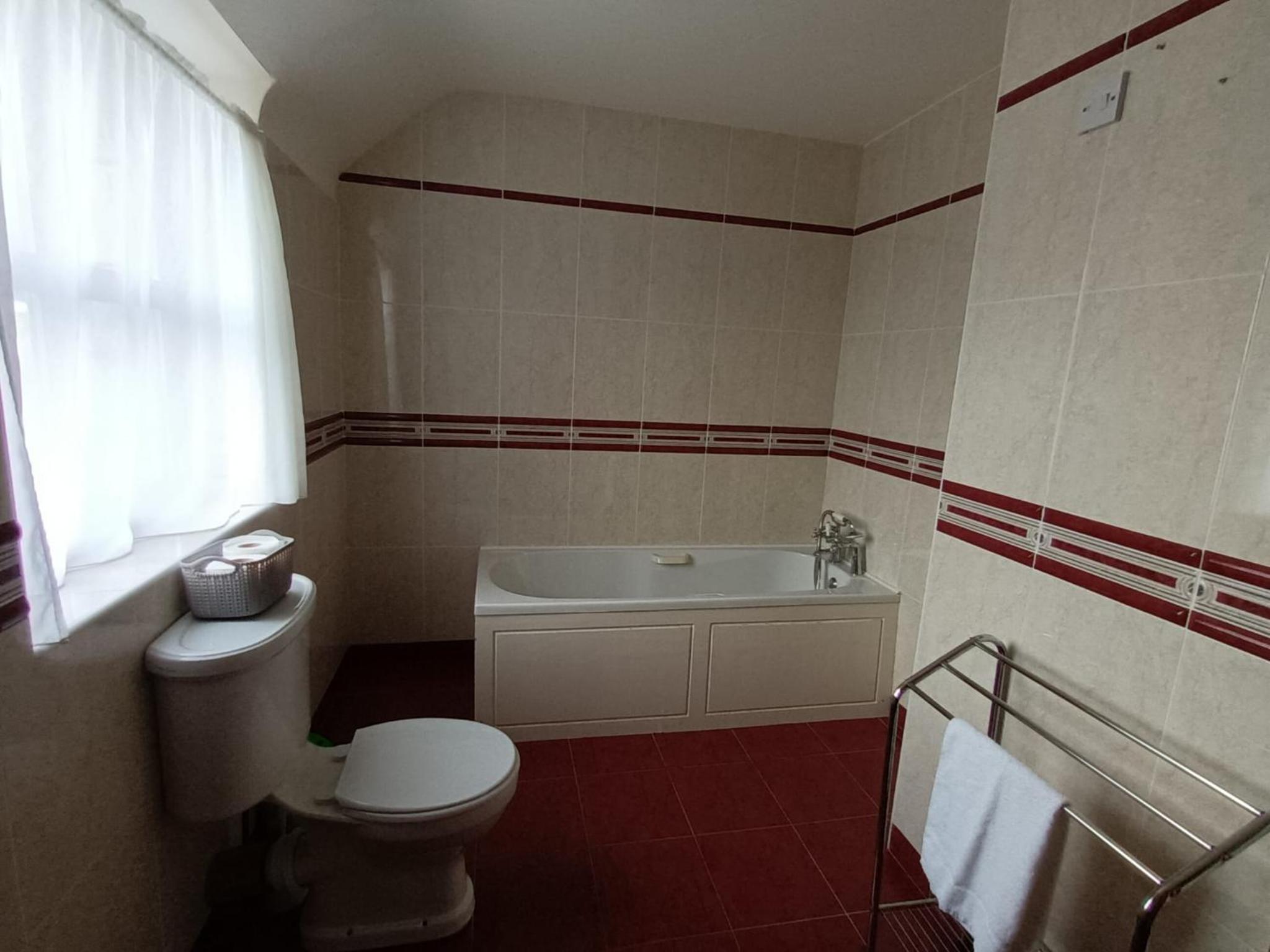 Four-Bedroom House - Photo 8