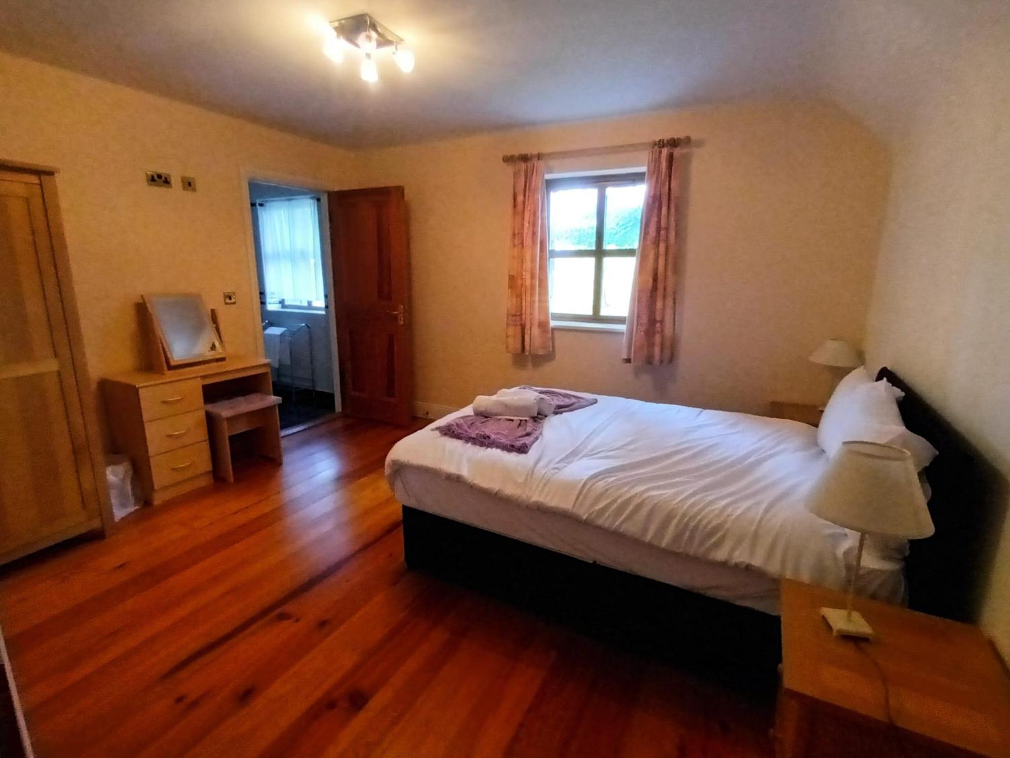 Four-Bedroom House - Photo 19
