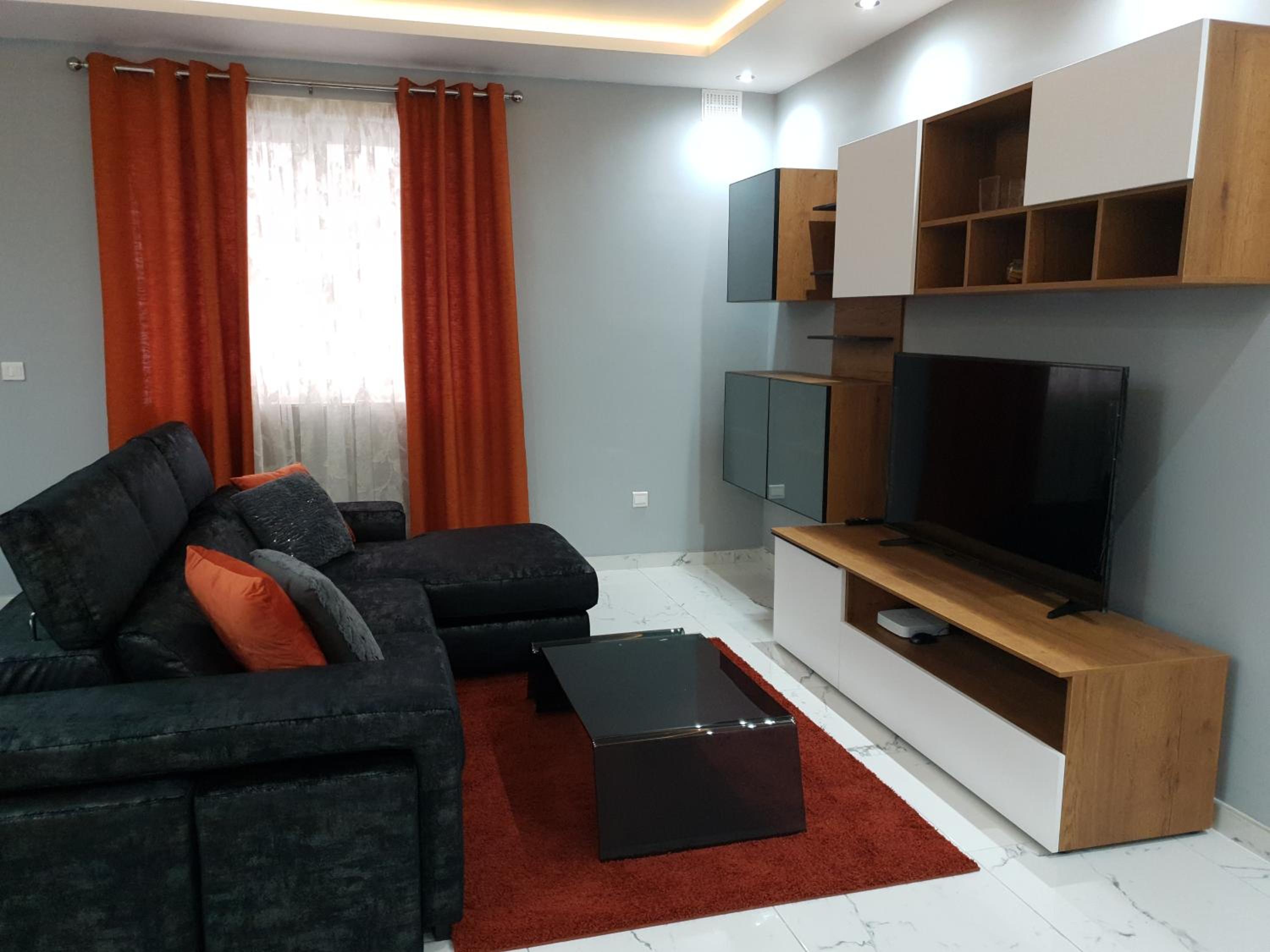Three-Bedroom Apartment photo 2