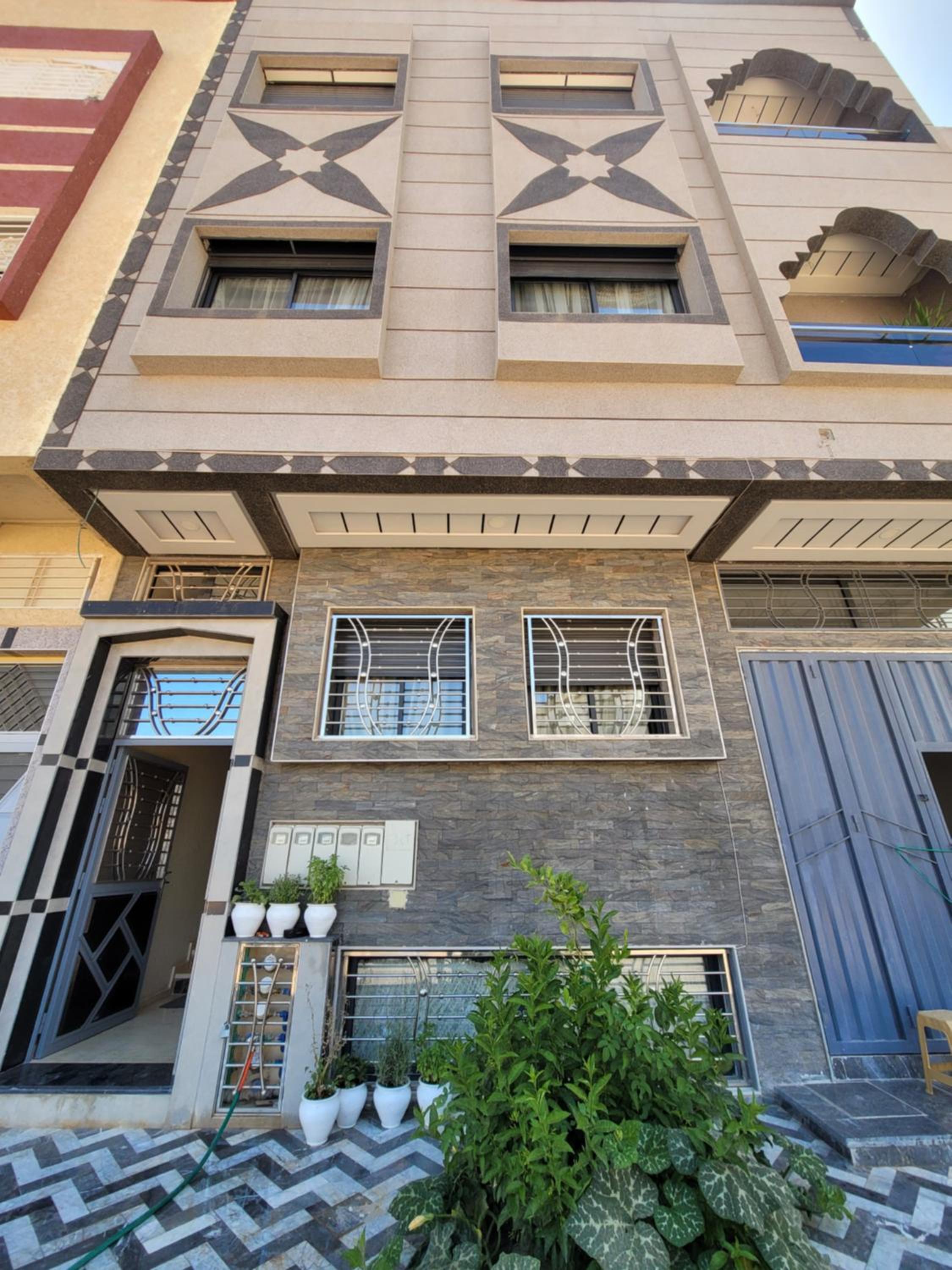 Three-Bedroom Apartment - Photo 2