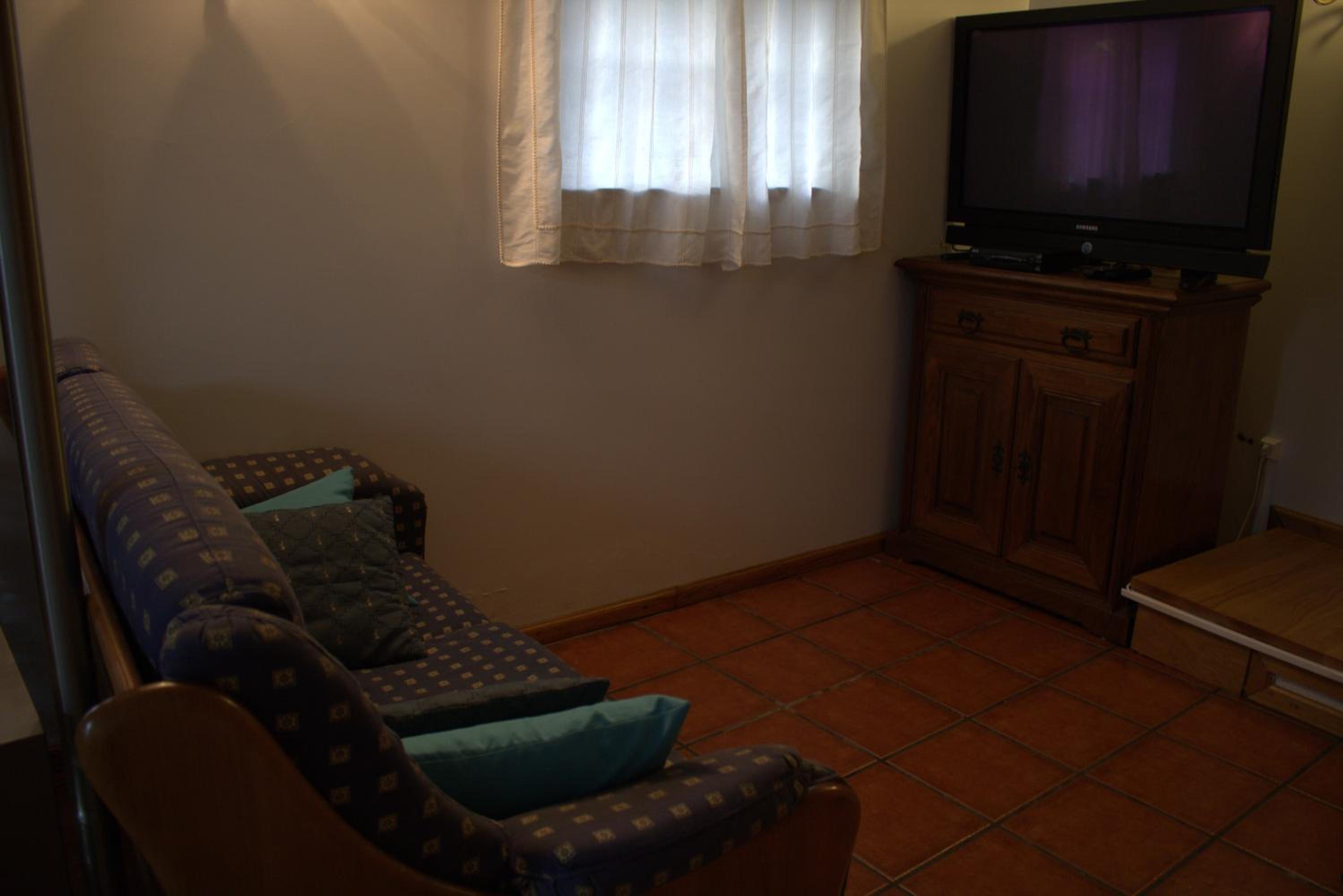 Three-Bedroom House - Photo 4