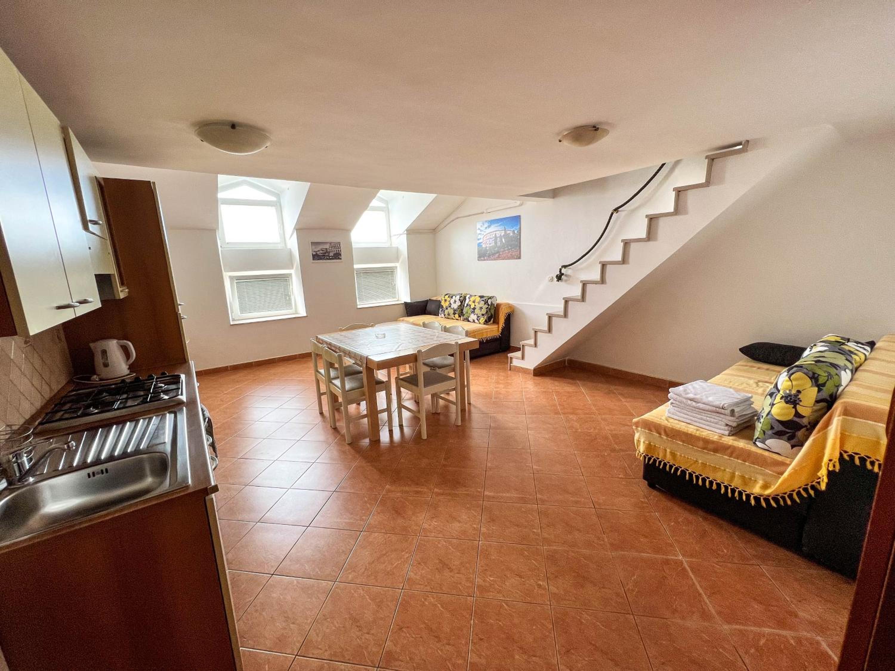 One-Bedroom Duplex Suite - Photo 1