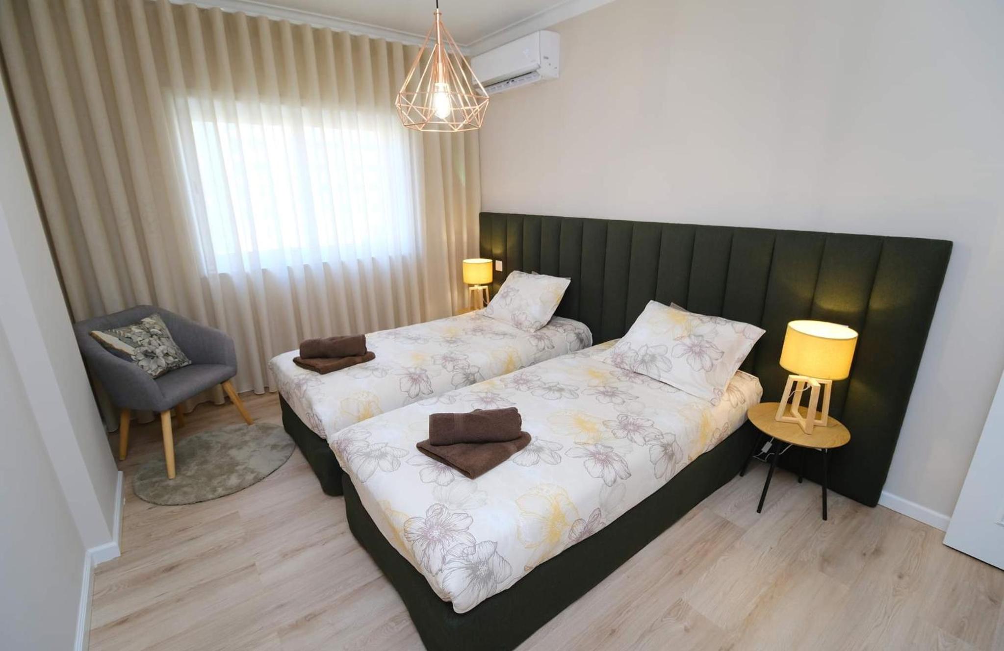 Three-Bedroom Apartment - Photo 19
