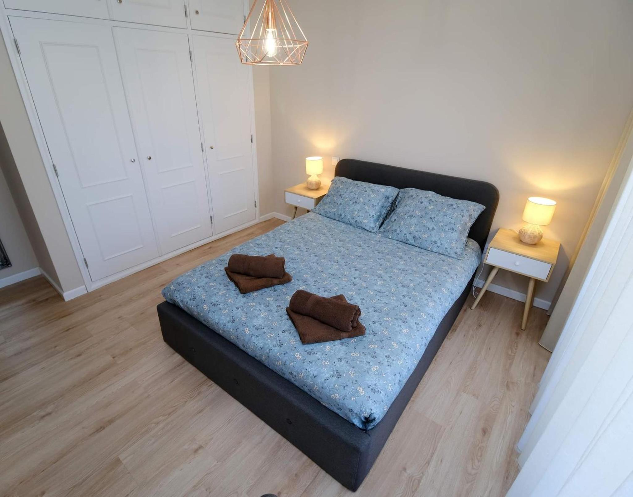 Three-Bedroom Apartment - Photo 23