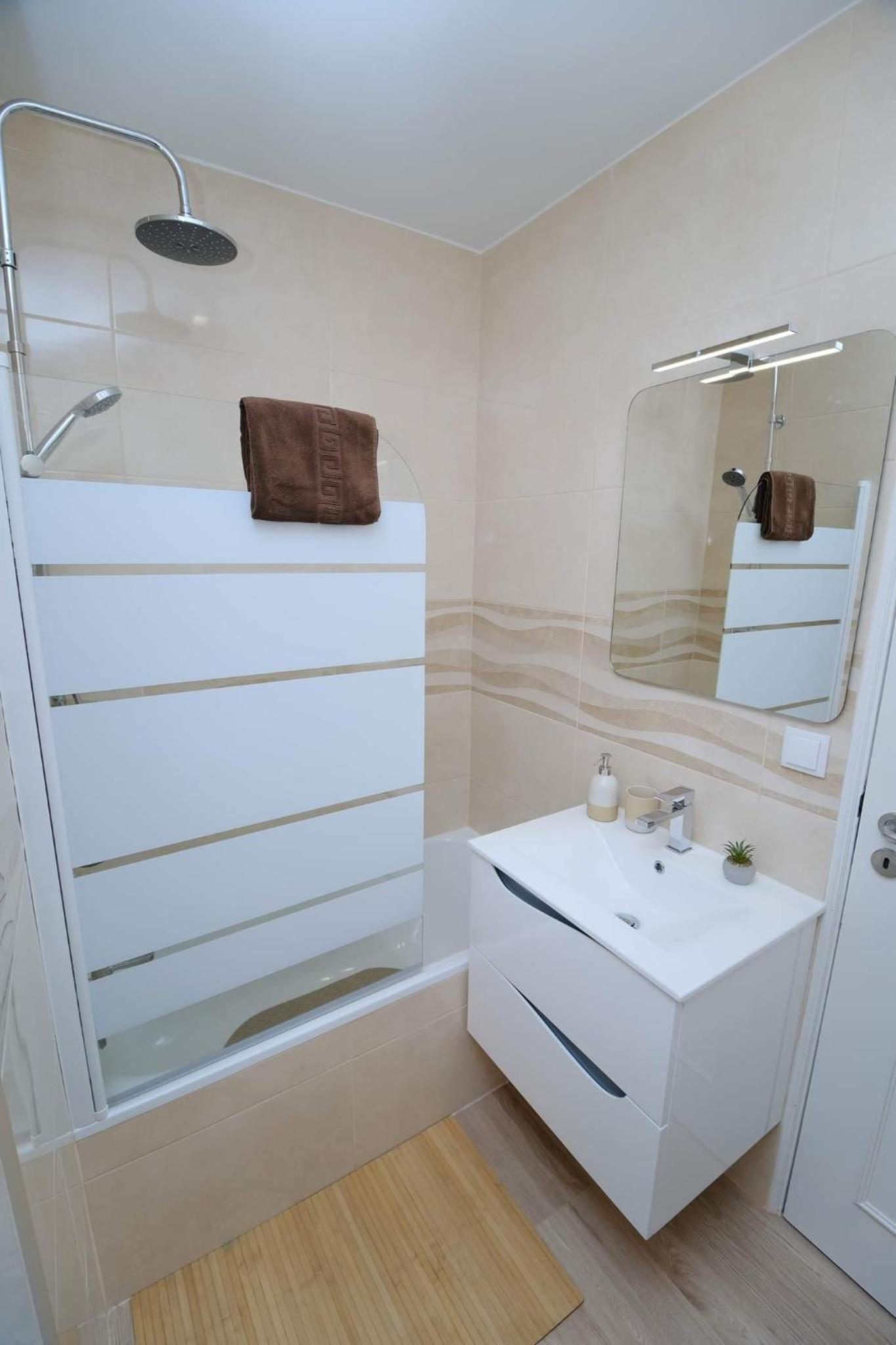 Three-Bedroom Apartment - Photo 26