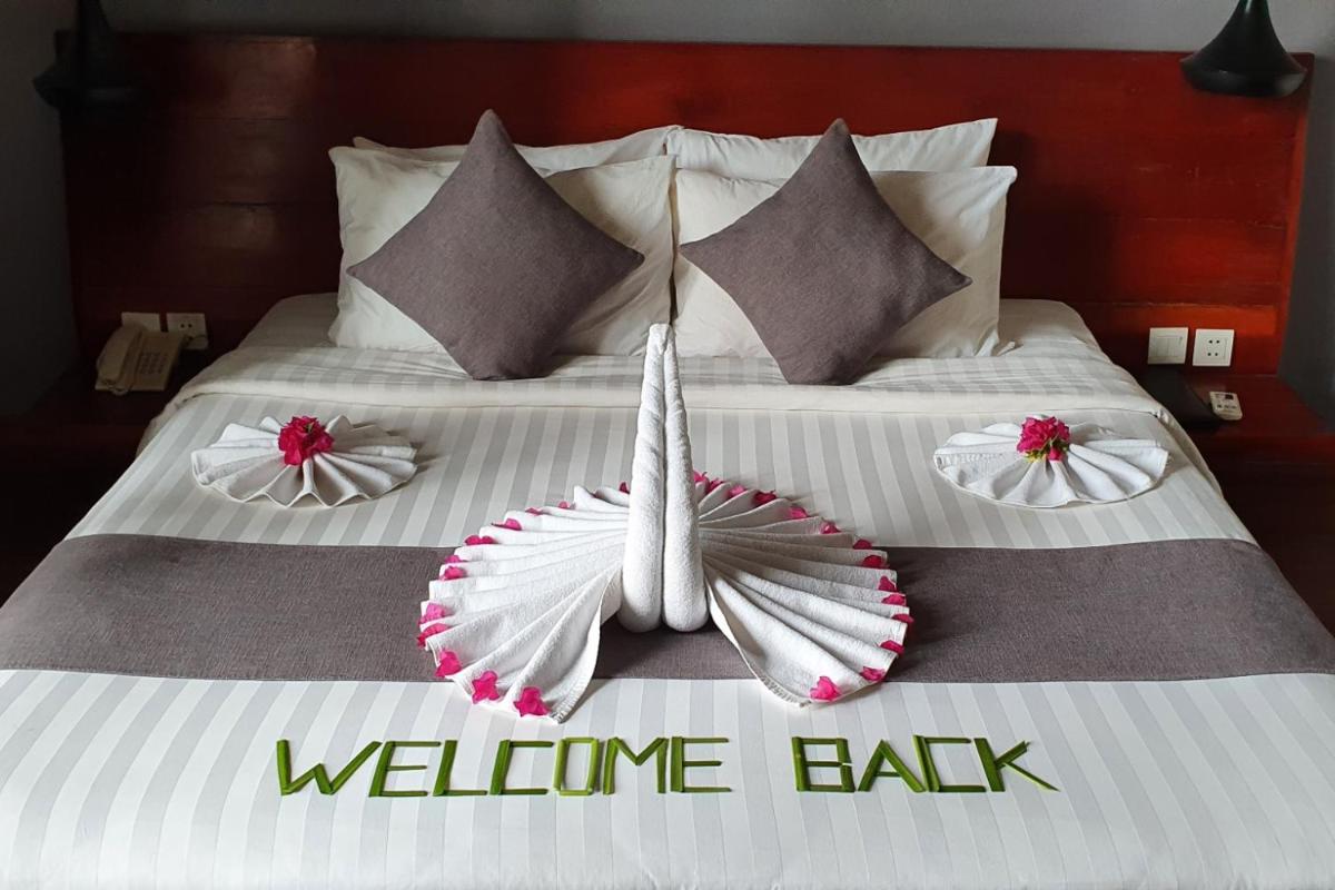 Deluxe Double Room with Balcony - Photo 16