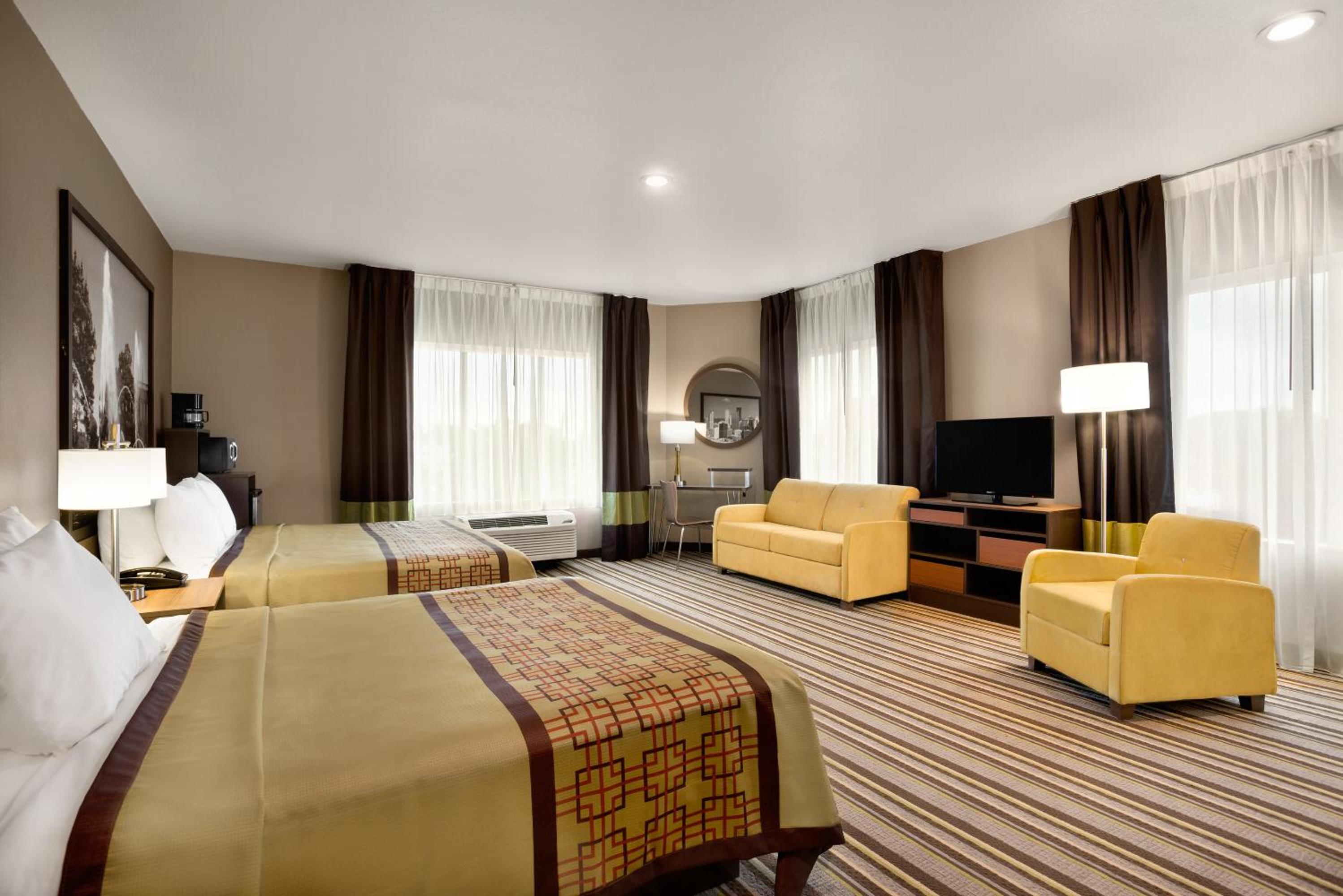 Studio Suite with One King Bed and One Queen Bed - Non-Smoking  photo 1