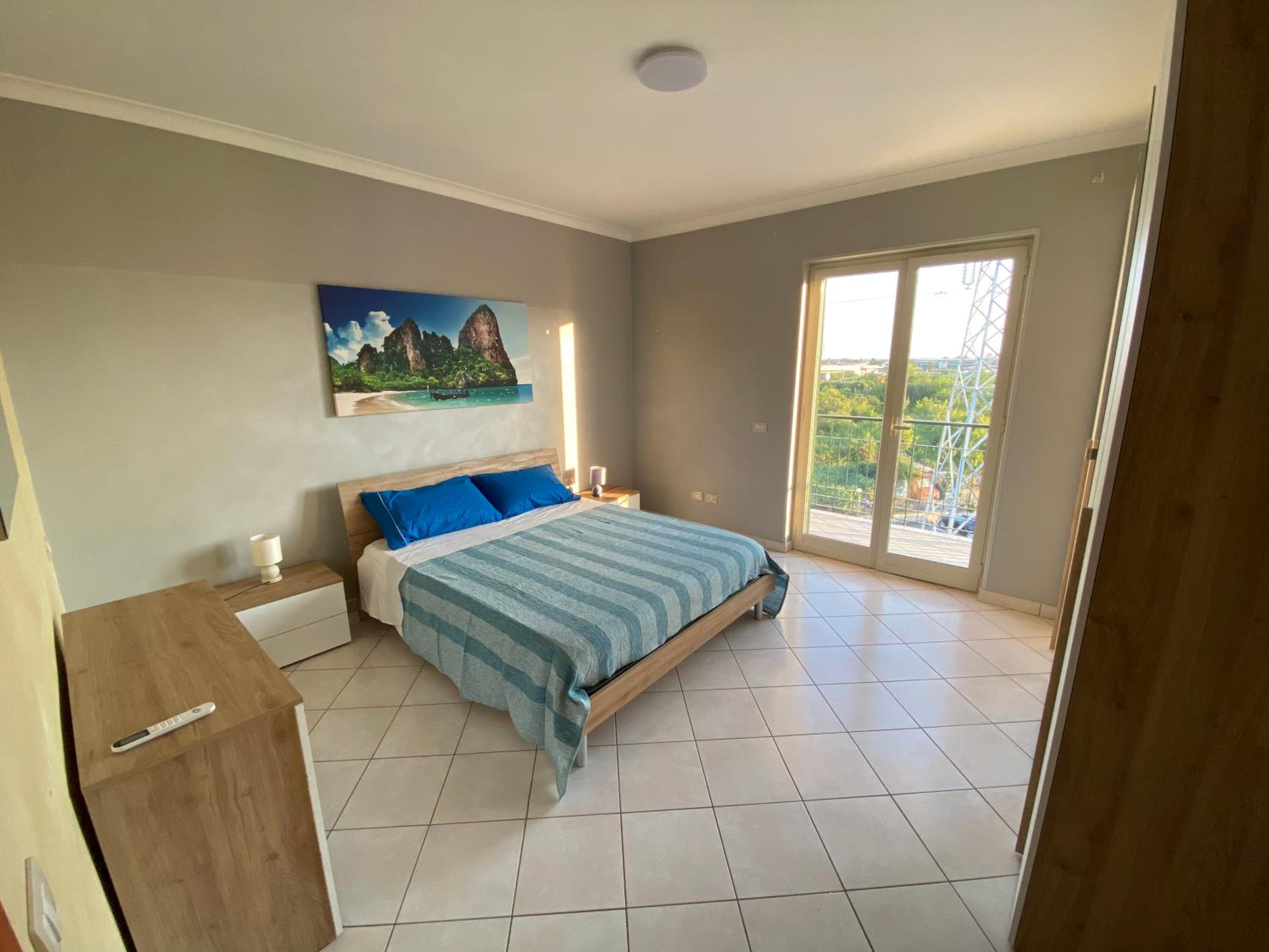 Three-Bedroom Apartment with Balcony photo 1