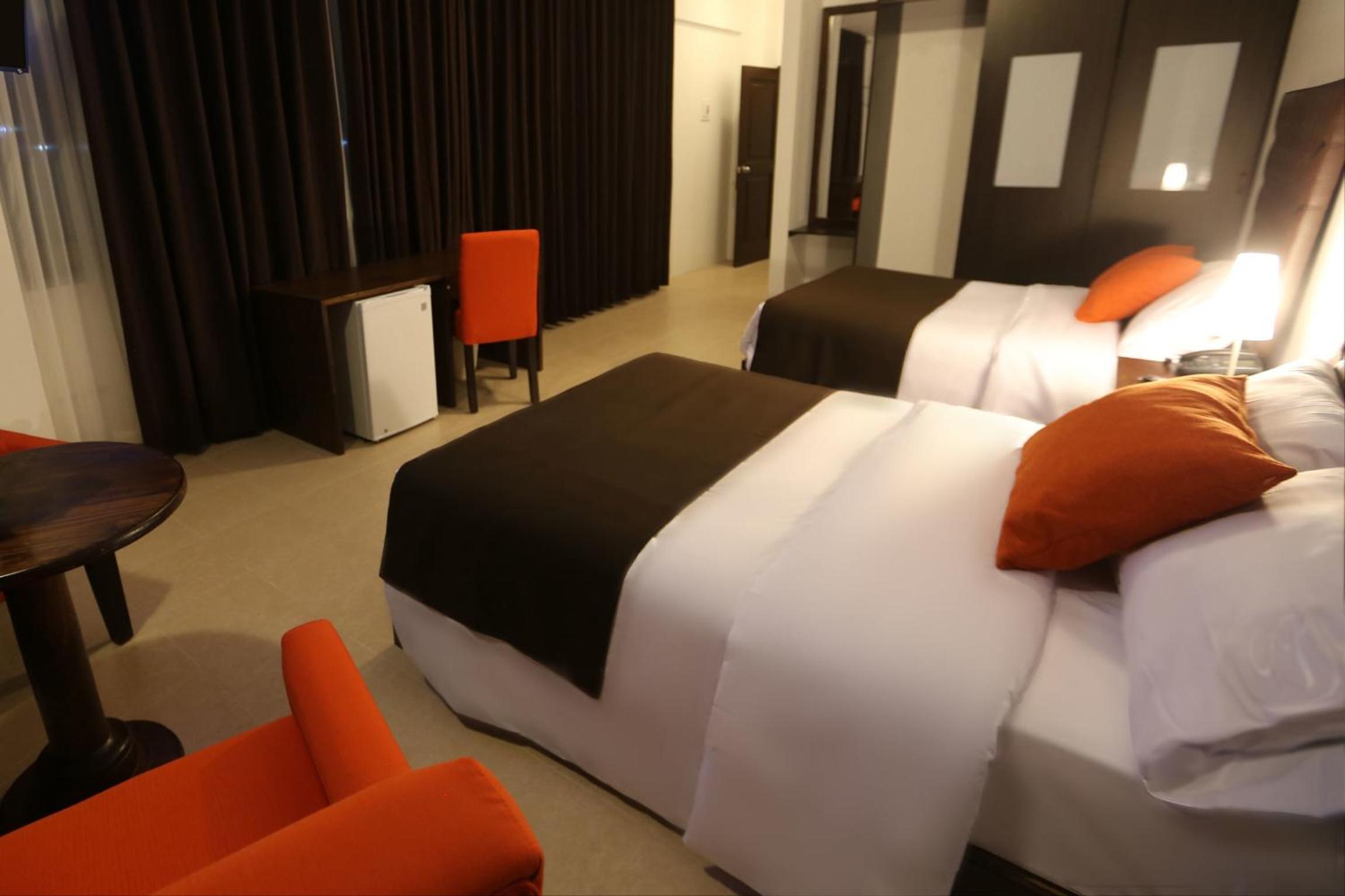Standard Twin Room with Two Double Beds photo 3