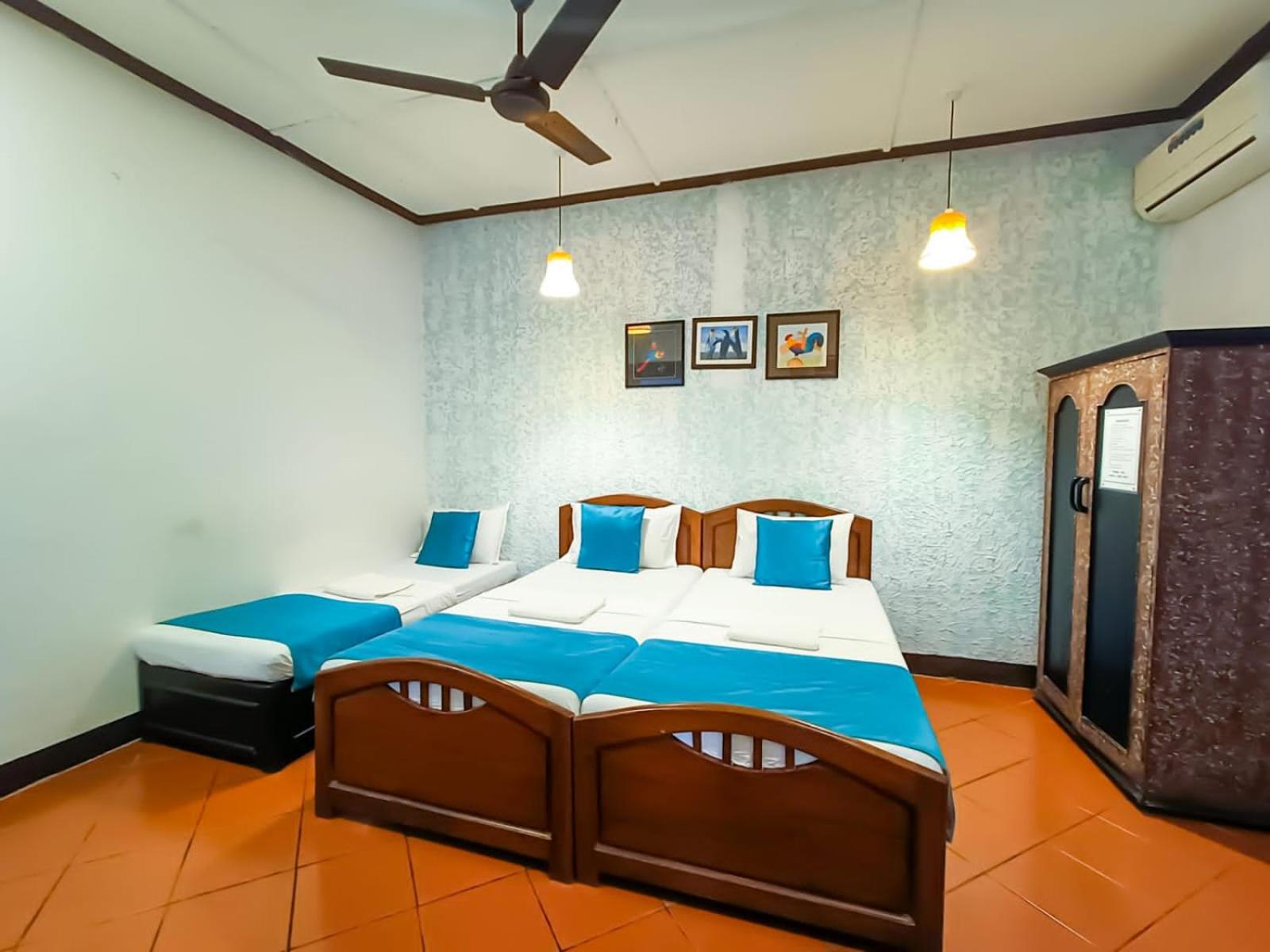 Deluxe Triple Room - Photo 1