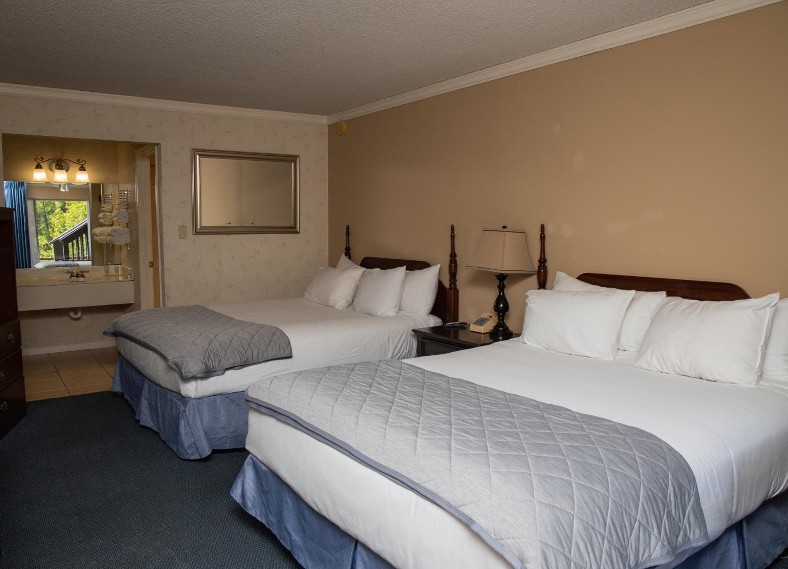 Queen Room with Two Queen Beds - Photo 1