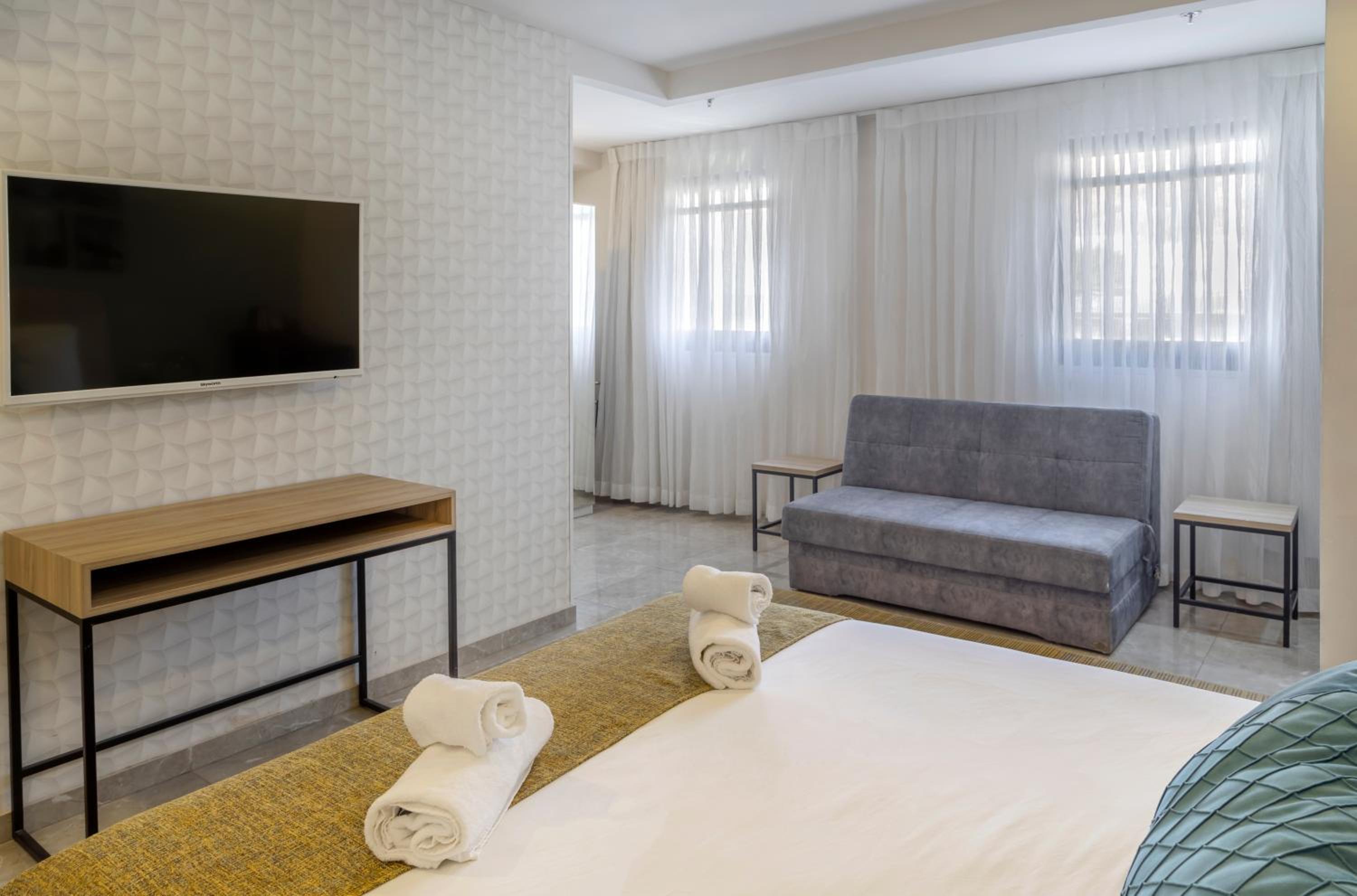 Deluxe Triple Room - Photo 1