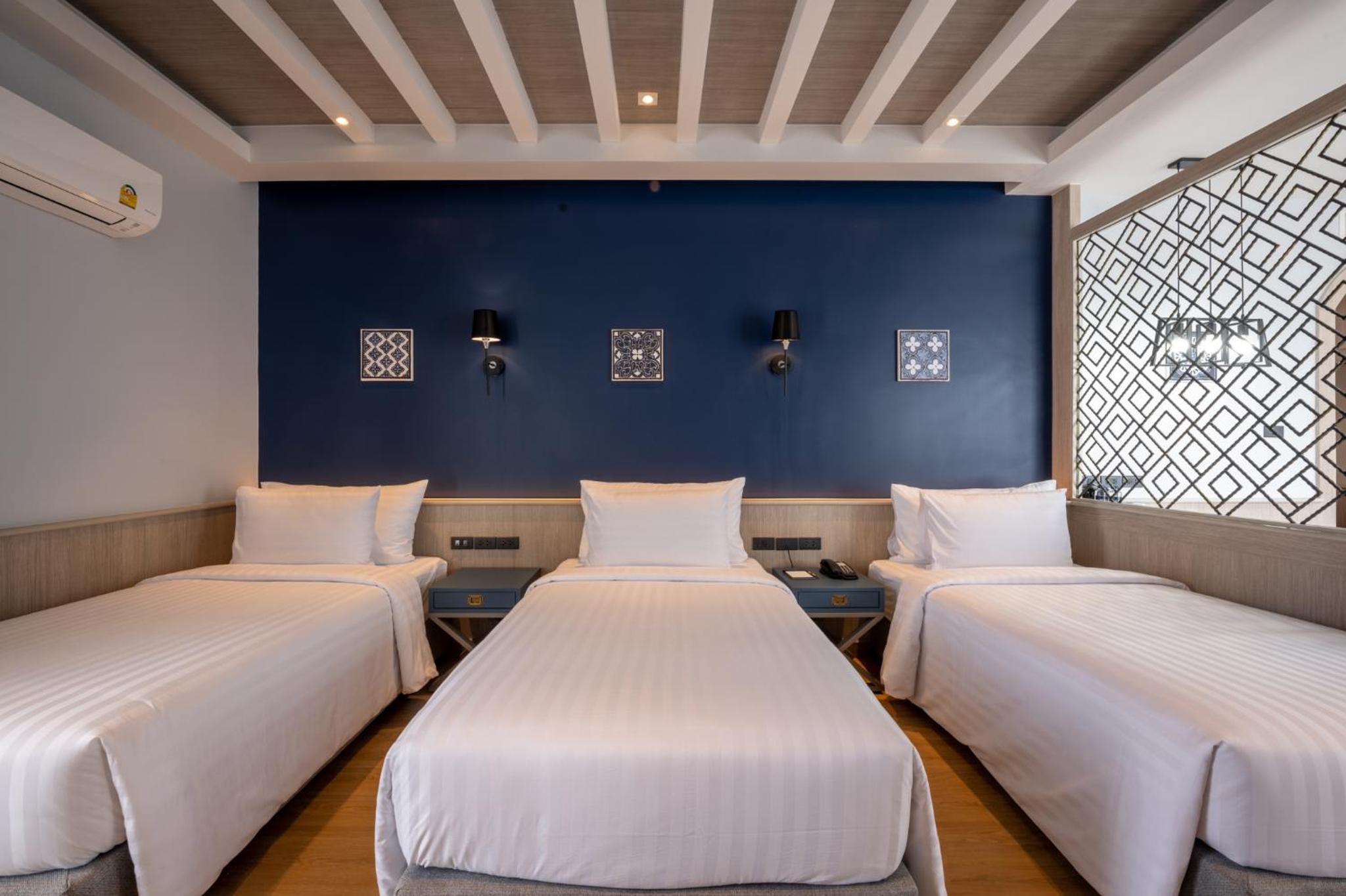 Deluxe Triple Room - Photo 9