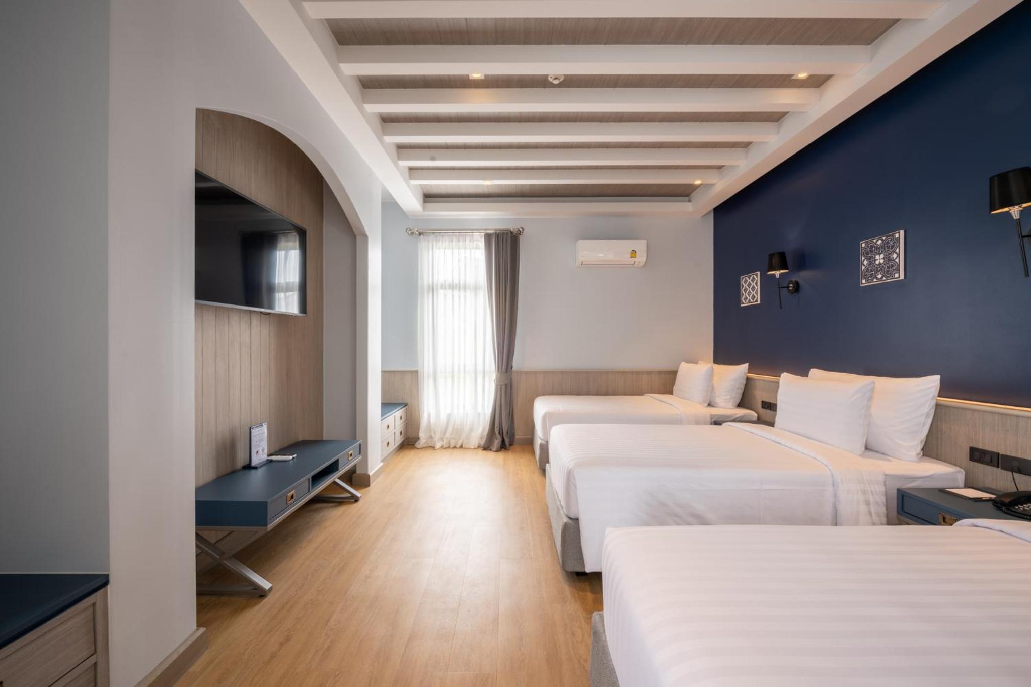 Deluxe Triple Room - Photo 1