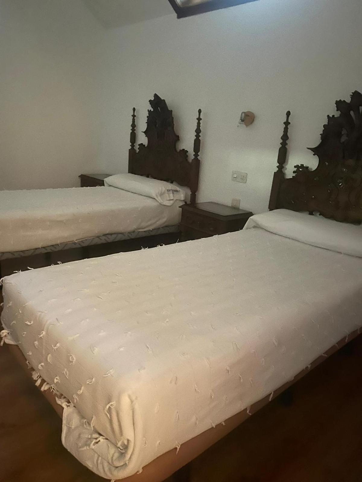 Habitación Cuádruple Económica con Baño Compartido
