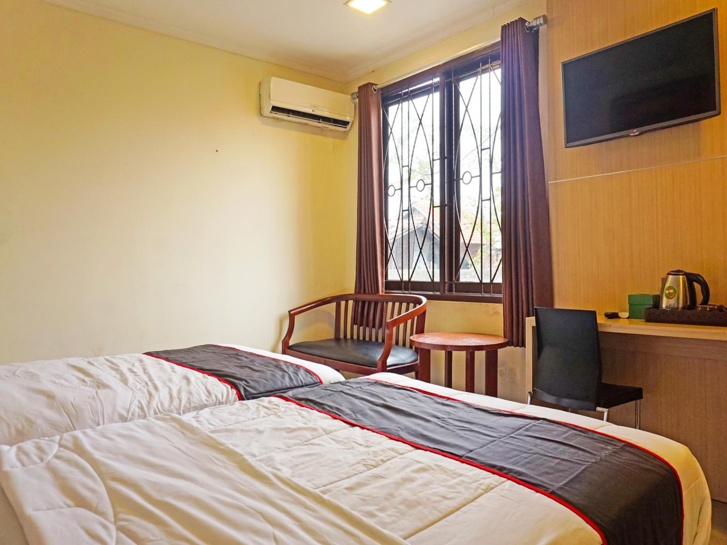 Delxue Twin Room - Photo 4