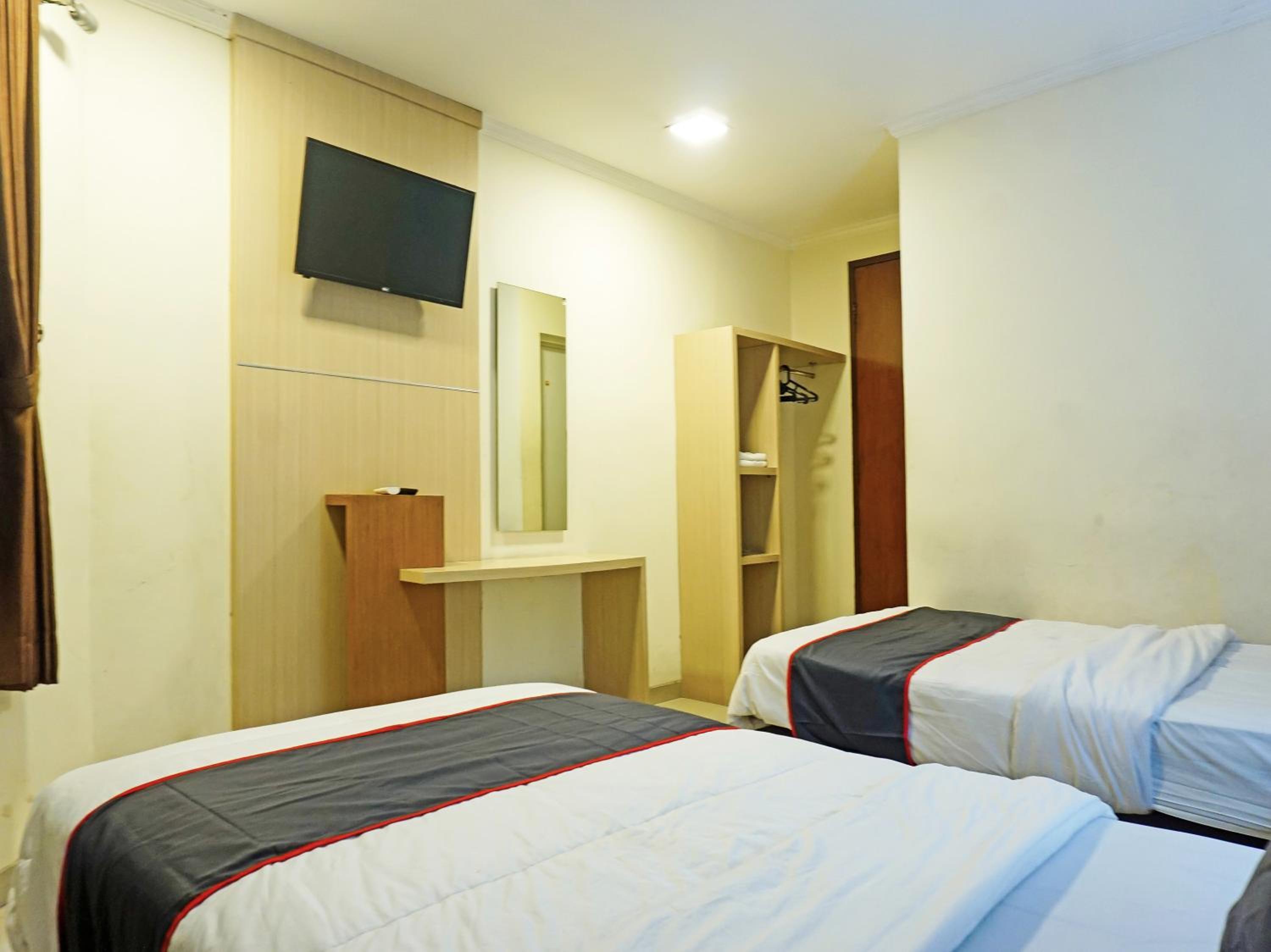 Standard Twin Room - Photo 4