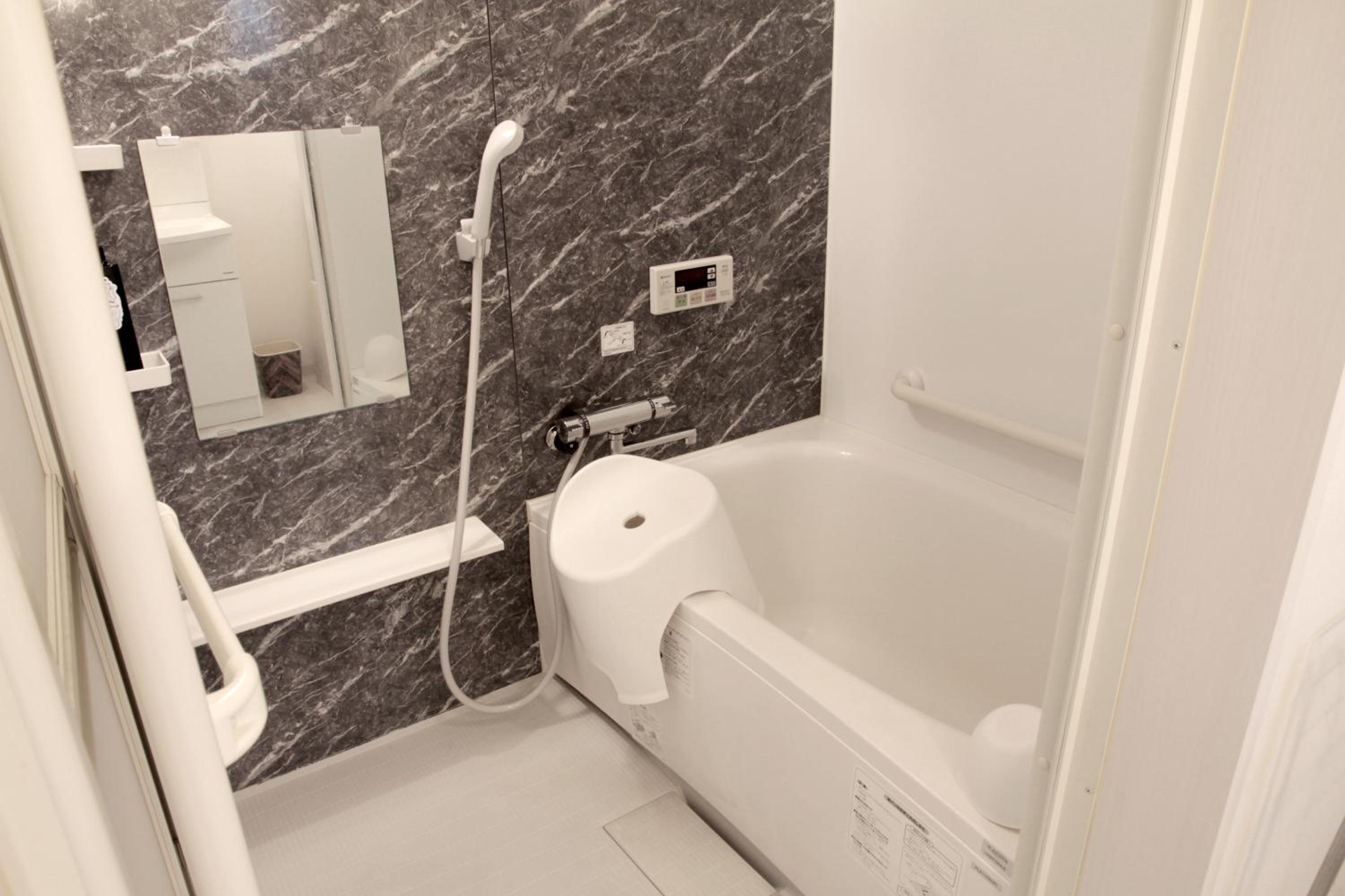 Two-Bedroom Apartment - Photo 38