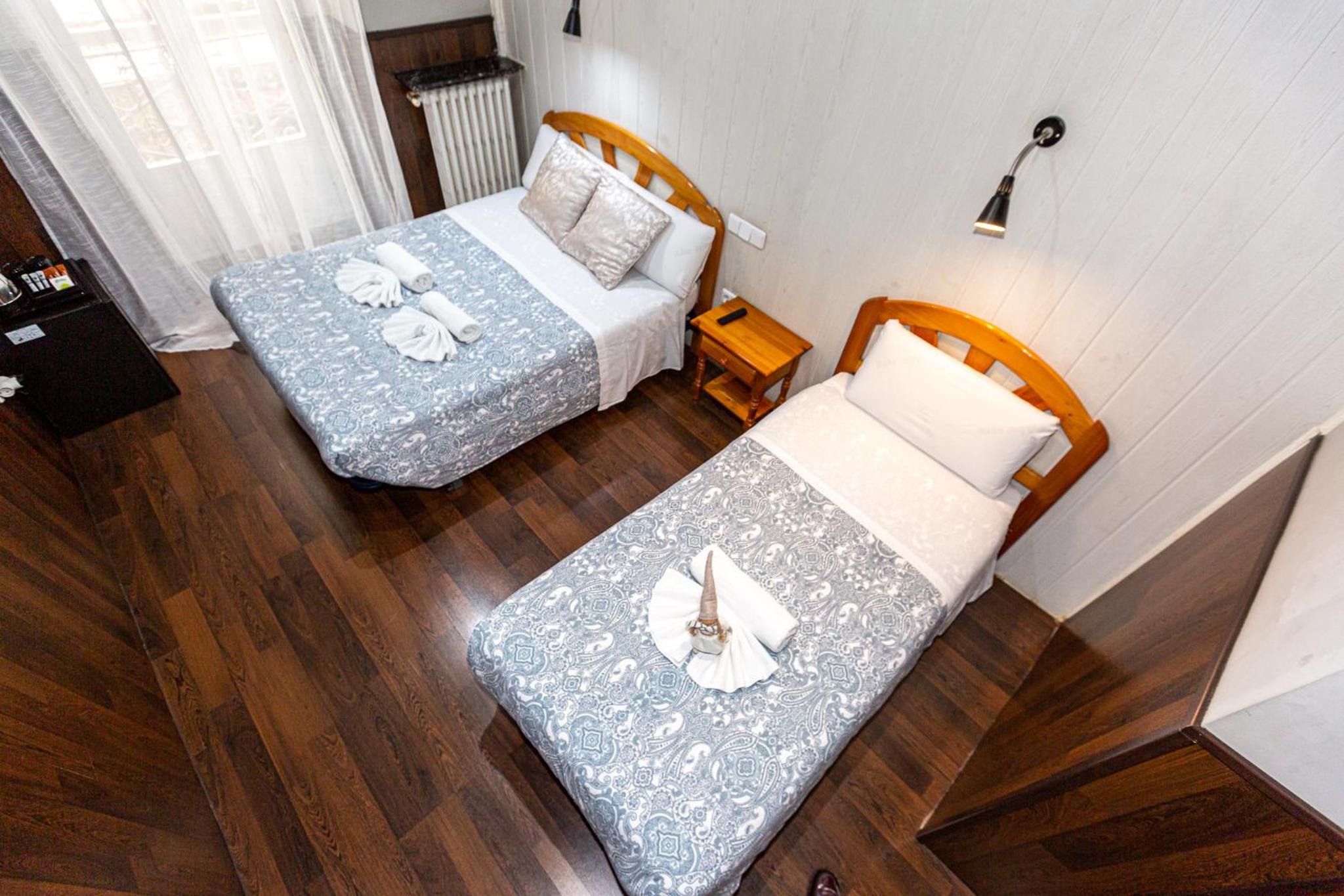 Standard Triple Room - Photo 1