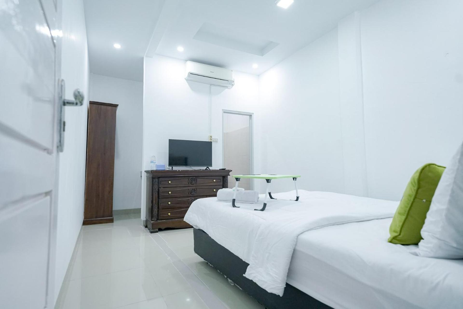 Deluxe Room - Photo 2