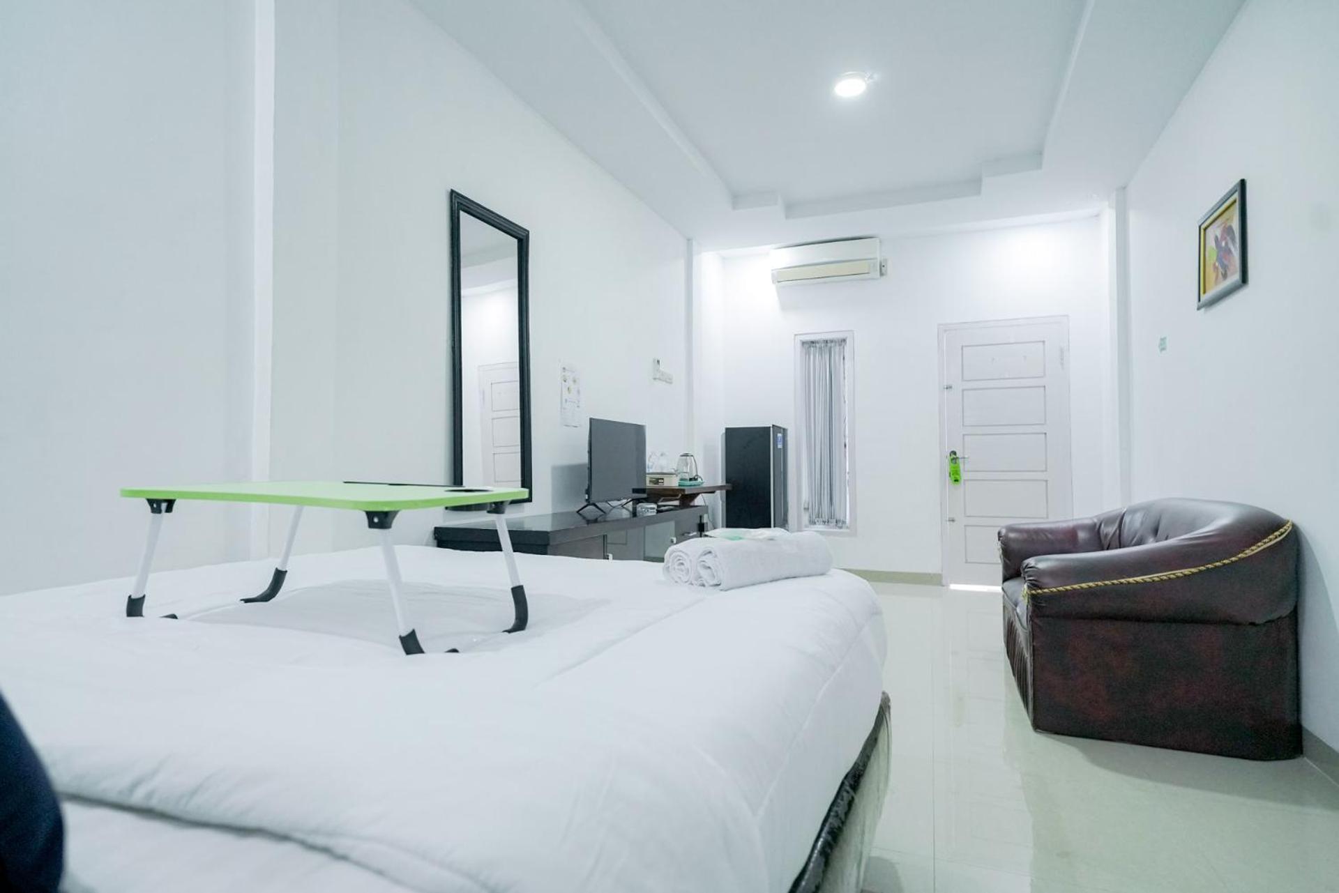 Deluxe Room - Photo 6