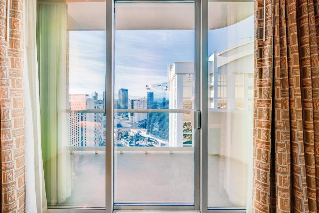 Elite 1BR Suite Strip View with Balcony - Photo 5