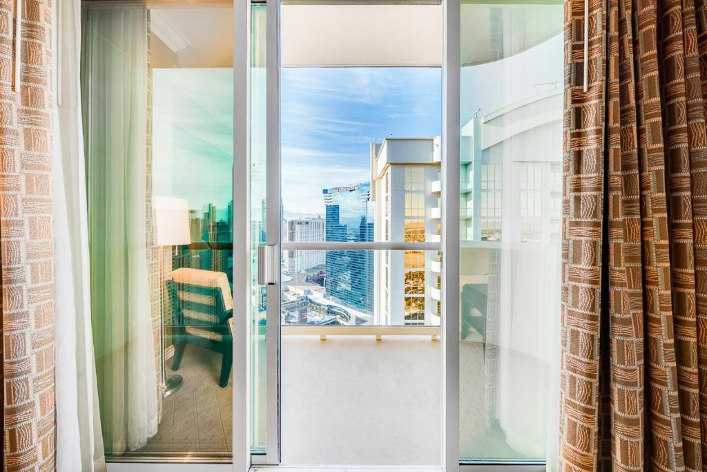 Elite 1BR Suite Strip View with Balcony - Photo 6