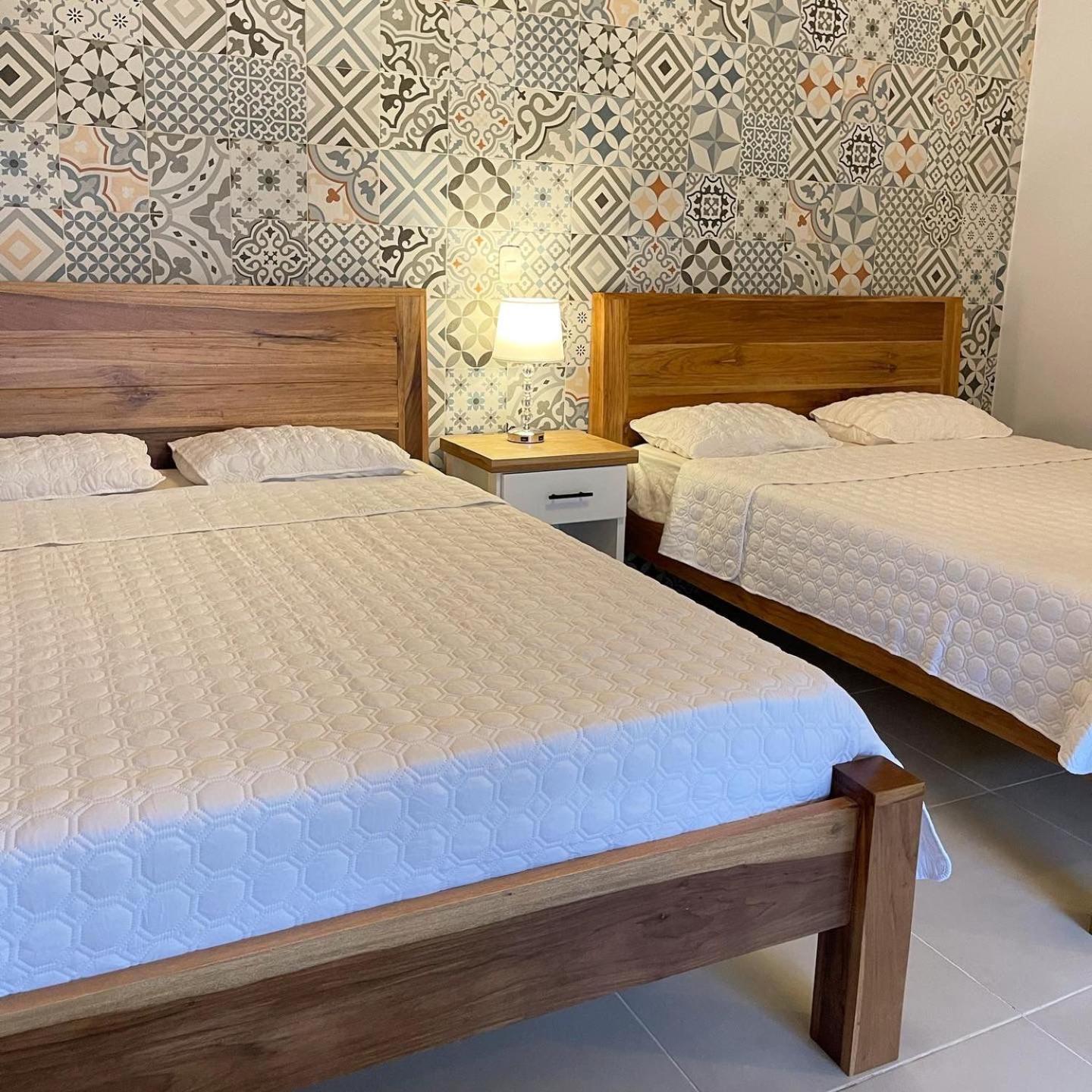 Standard Doppelzimmer mit zwei Doppelbetten
