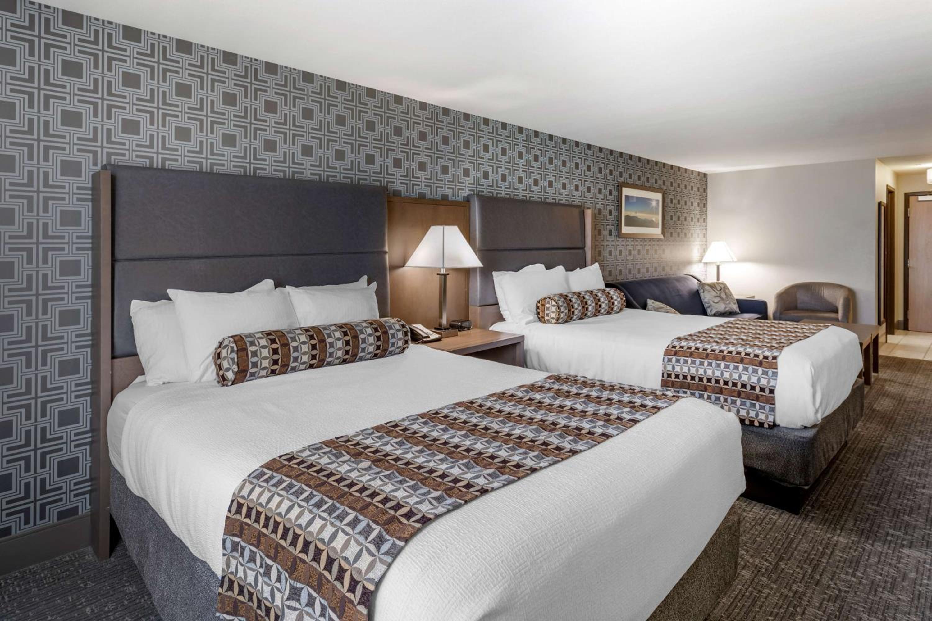Queen Room with Two Queen Beds and Sofa Bed - Photo 1