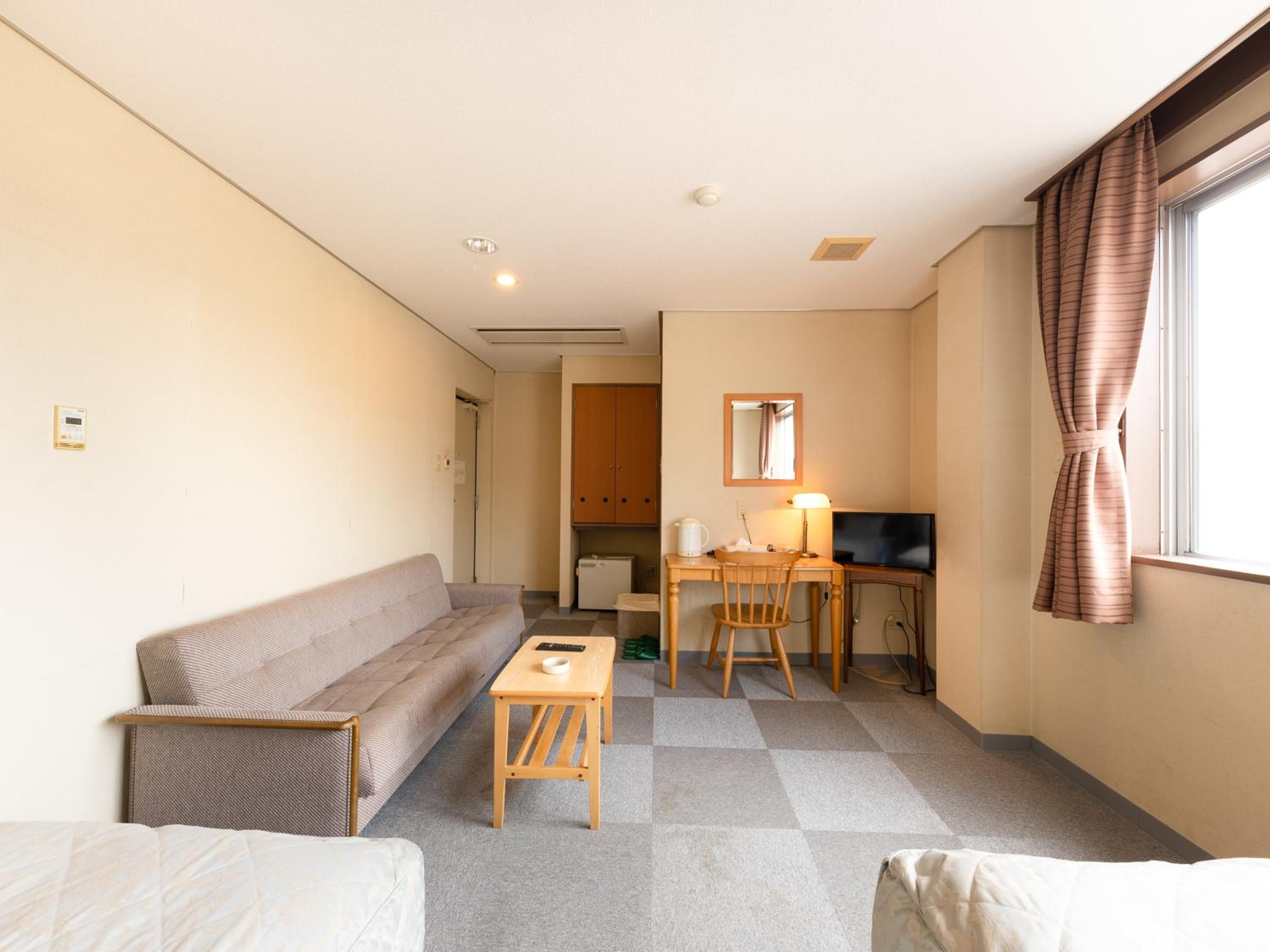 Standard Twin Room - Non-Smoking - Photo 9